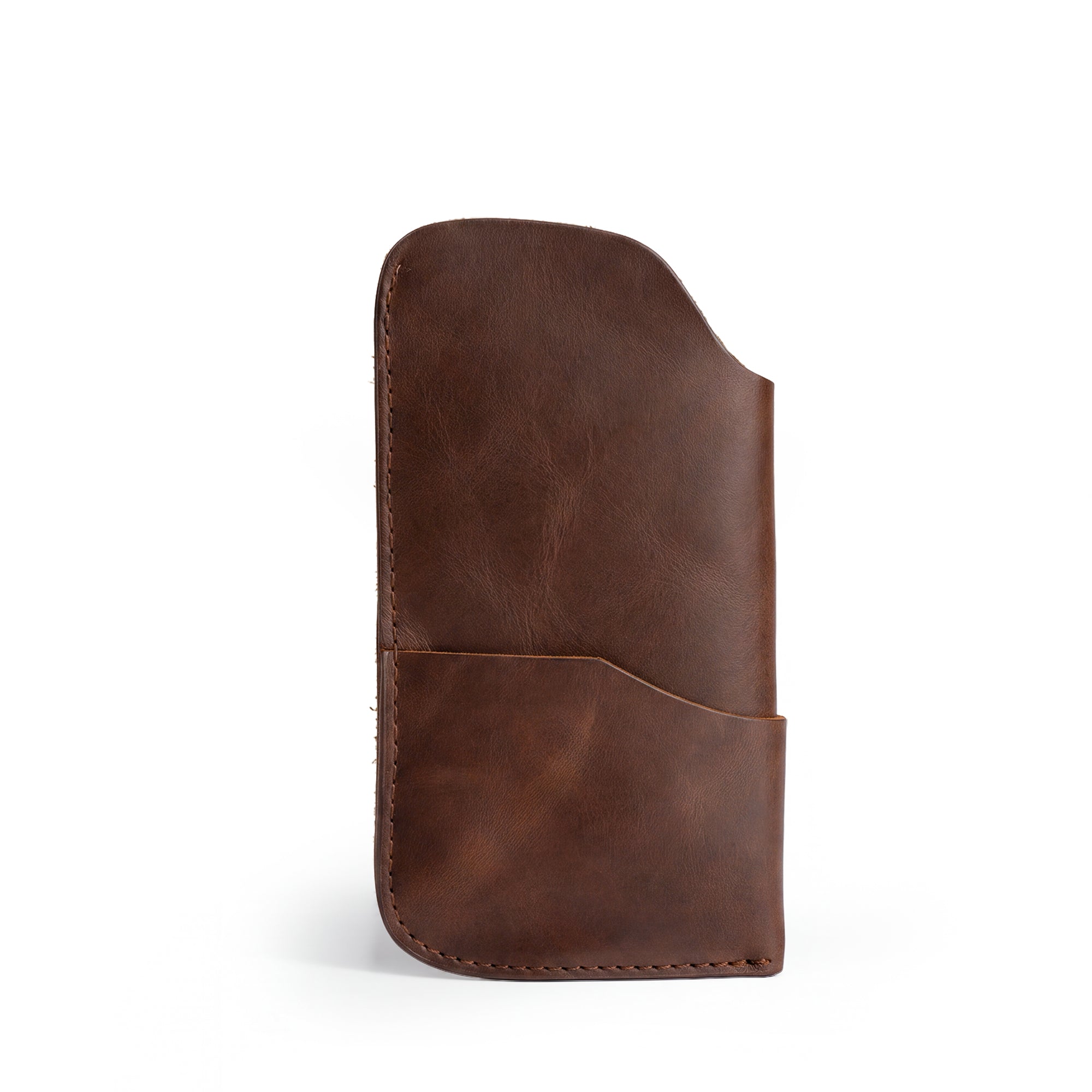 The Hide & Drink Sunglass Case & Wallet displayed elegantly, highlighting its Full Grain Leather craftsmanship. This Rustic Sunglasses Case & Wallet is perfect for those needing a stylish eyeglasses sleeve for travel, featuring artisan touches from La Antigua Guatemala & Oaxaca Mexico.