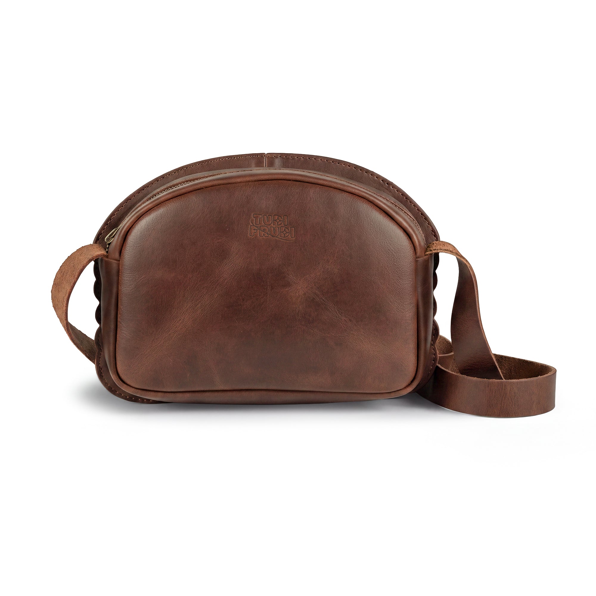 Stylish Burger-Shaped Shoulder Bag featuring vibrant layers, crafted by Tudi Frudi. This unique bag is perfect for adding a fun touch to your outfit while being a practical Travel Accessory. Enjoy its Full Grain Leather texture in this small batch production item, handmade in La Antigua Guatemala & Oaxaca Mexico. Ideal as a Crossbody Bag or Messenger Bag, it's both eye-catching and functional.