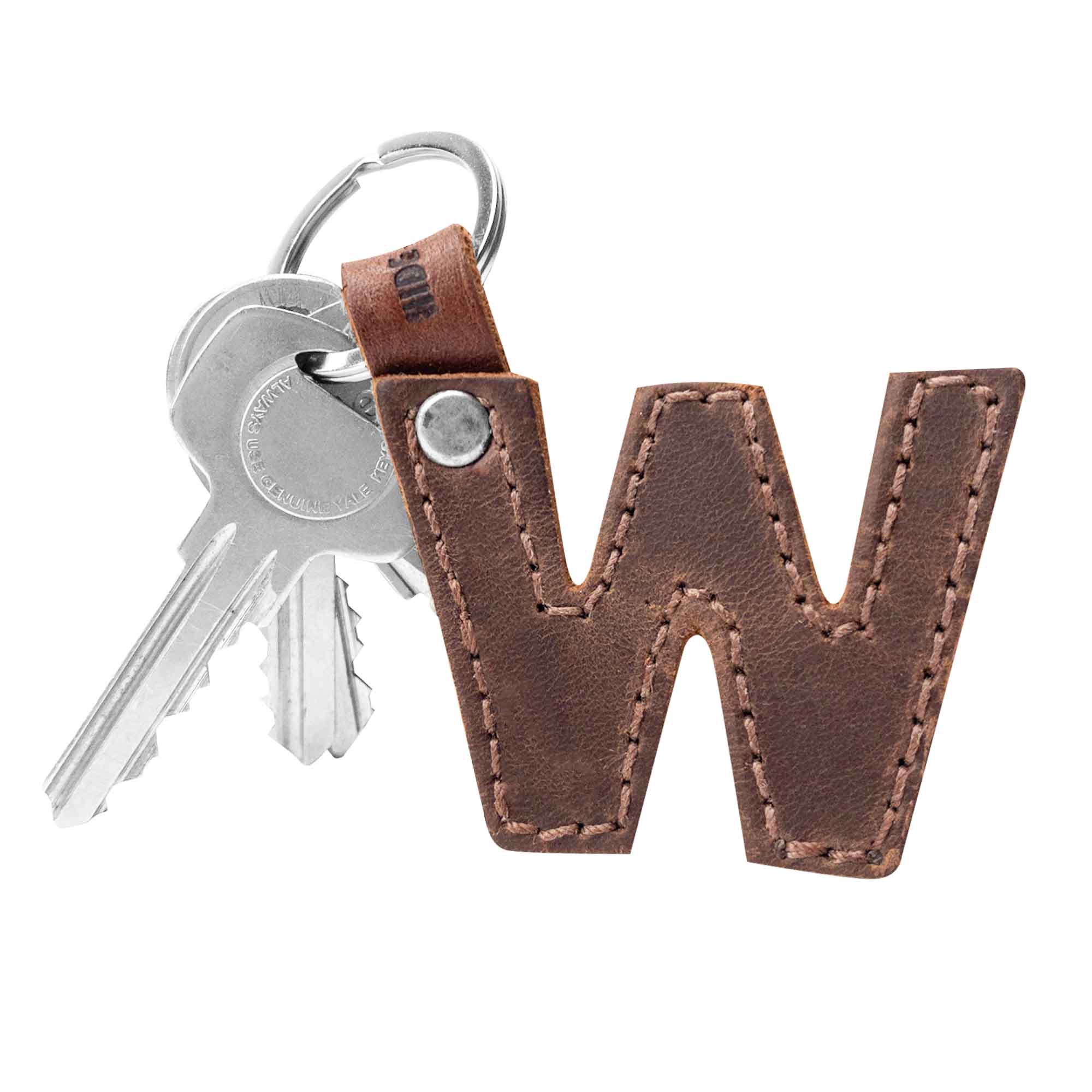 Letter W keychain from Hide & Drink, made with thick leather. This stylish Alphabet Letter Keychain features Full Grain Leather and reflects artisan craftsmanship from small batch production in La Antigua Guatemala.