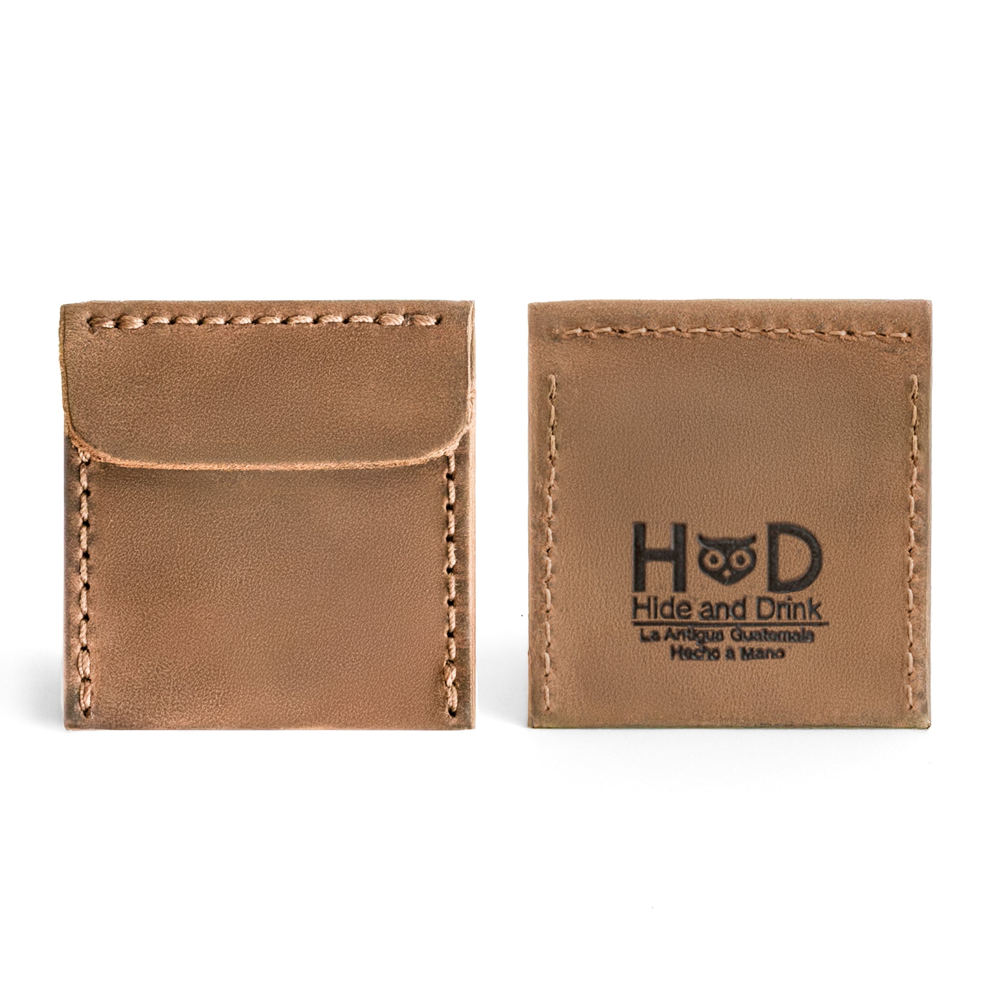 Stylish front of the Hide & Drink Wedding Ring Case made from beautiful tan full grain leather. A small batch production piece suitable as a pouch organizer for travel or showcasing engagement rings, hand cut and sewn in La Antigua Guatemala & Oaxaca Mexico.