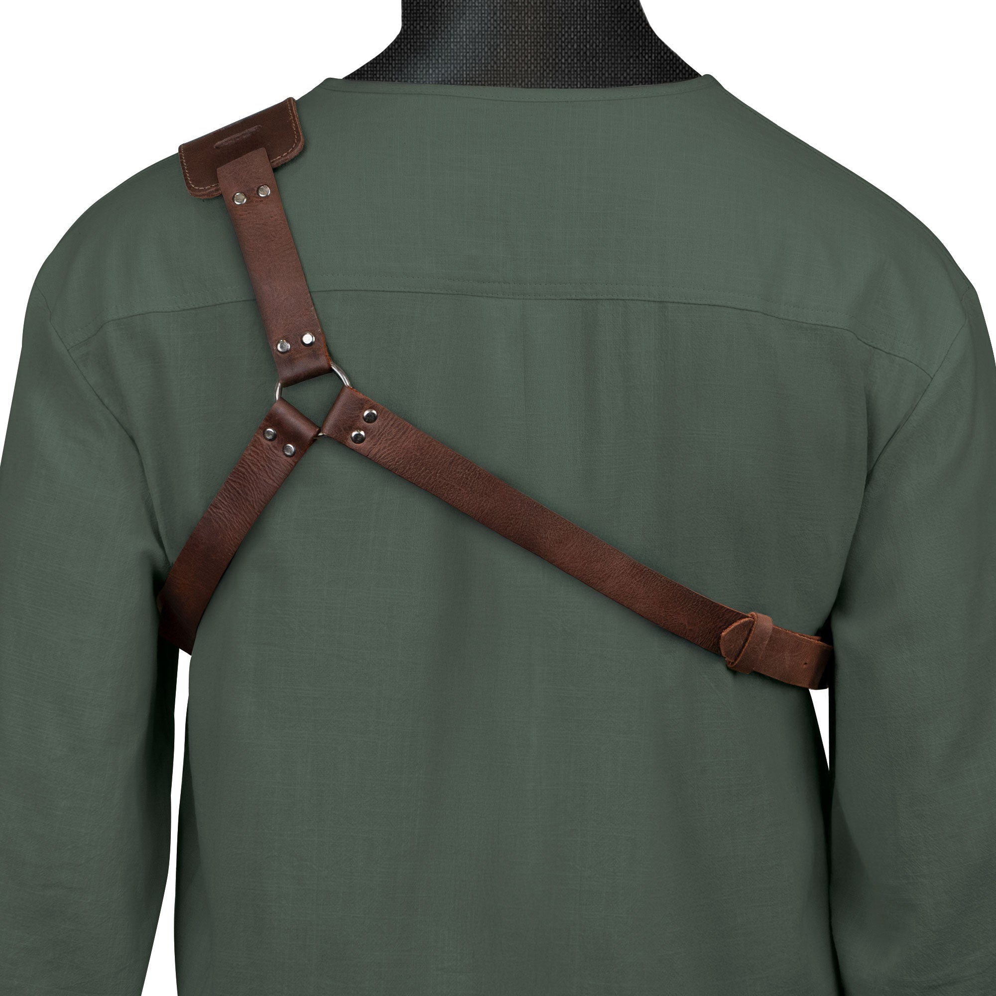 Back view of the Hide & Play Gladiator Harness on a model, highlighting the adjustable straps. This Gladiator Shoulder Harness is perfect for cosplay and costume parties, crafted from full grain leather. The handmade piece features small batch production techniques, is hand cut, hand sewn, and fire branded, showcasing artisan craftsmanship from La Antigua Guatemala & Oaxaca Mexico.