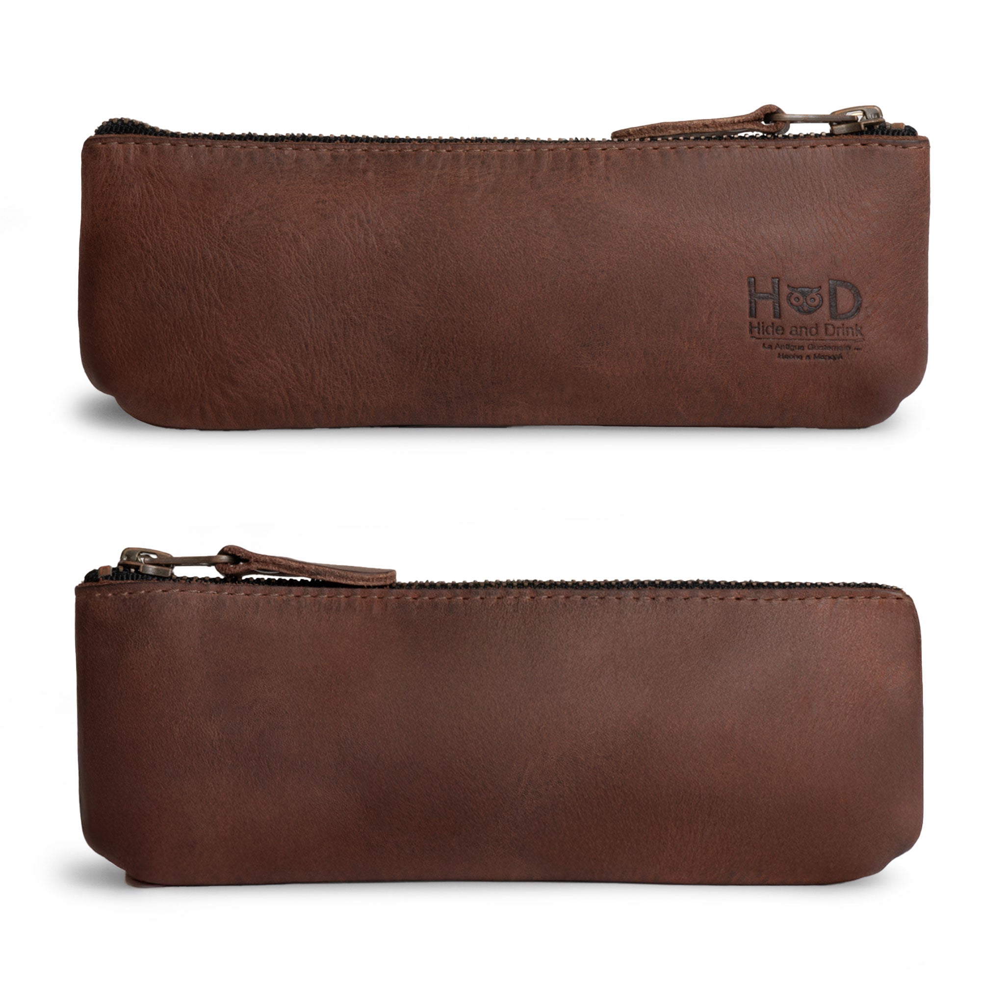 Sleek and stylish Pencil Pouch by Hide & Drink, showcasing a rectangular design in full grain leather, perfect as a pen & marker pouch for men and women. This flat zippered holder features classic style ideal for artists. Handmade in La Antigua Guatemala & Oaxaca Mexico, each product is artisan-crafted with small batch production and includes fire branding.