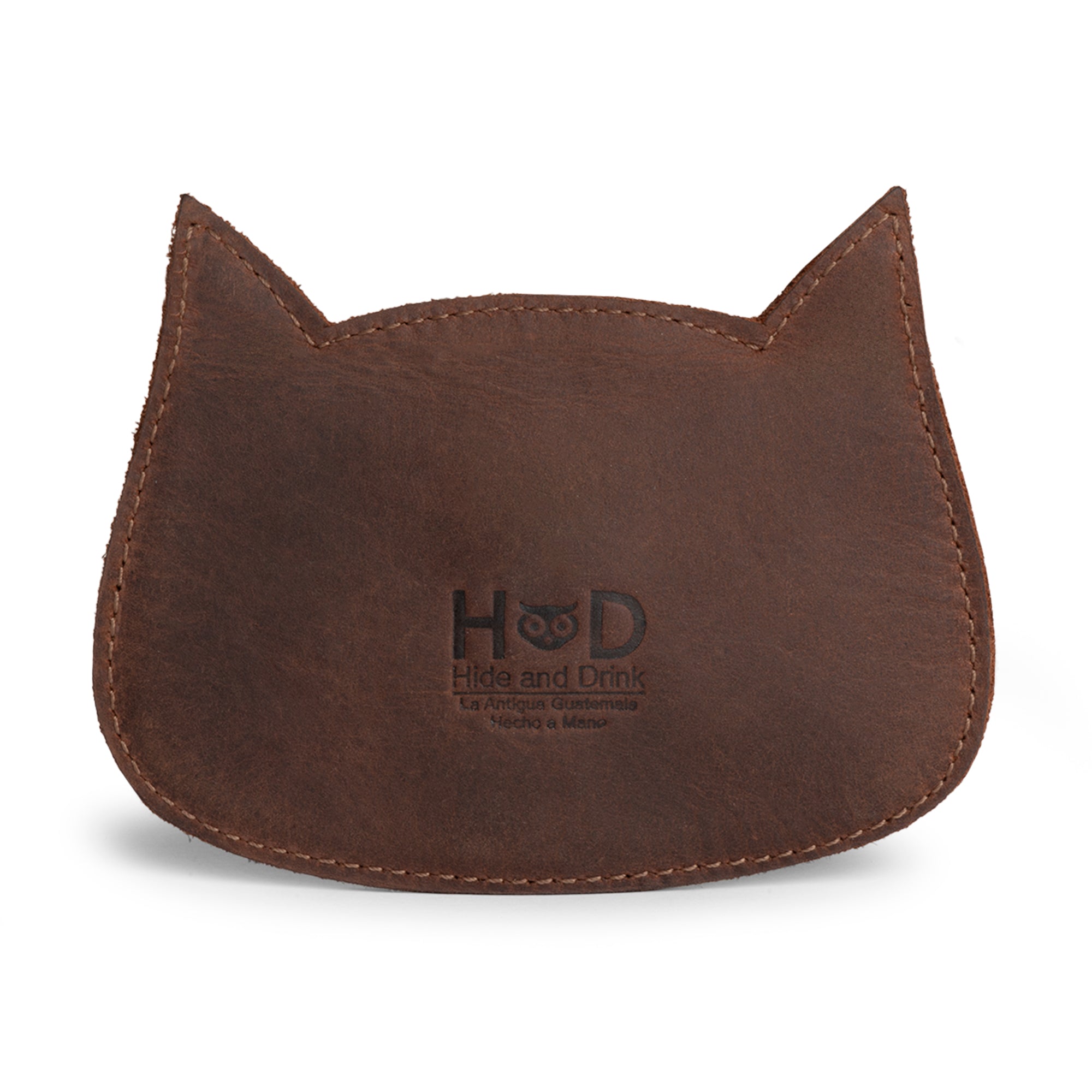 Hide & Drink Leather Cat Wallet closed with a button, showcasing its design. This Full Grain Leather Cat-Shaped Wallet is perfect for organizing your coins and bills, made by dedicated artisans in La Antigua Guatemala & Oaxaca Mexico.
