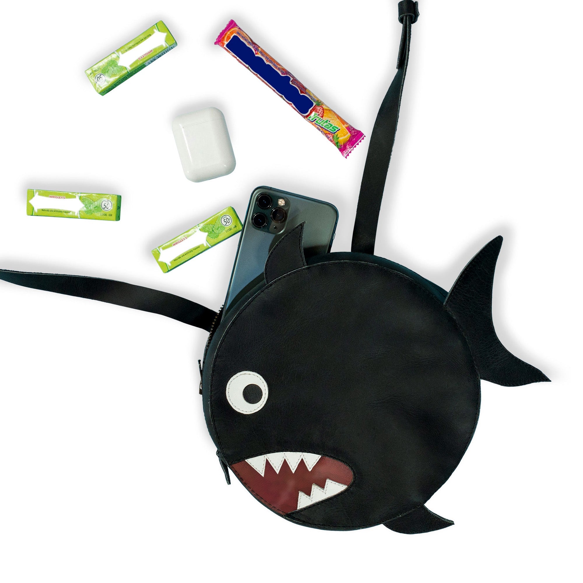 Inside Tudi Frudi's Piranha-Shaped Shoulder Bag, you'll find ample space for essentials like your phone and snacks. This versatile Crossbody Bag exemplifies the unique charm of the Piranha-Shaped Circular Shoulder Bag, made from durable Full Grain Leather, blending function and fun for everyday use.