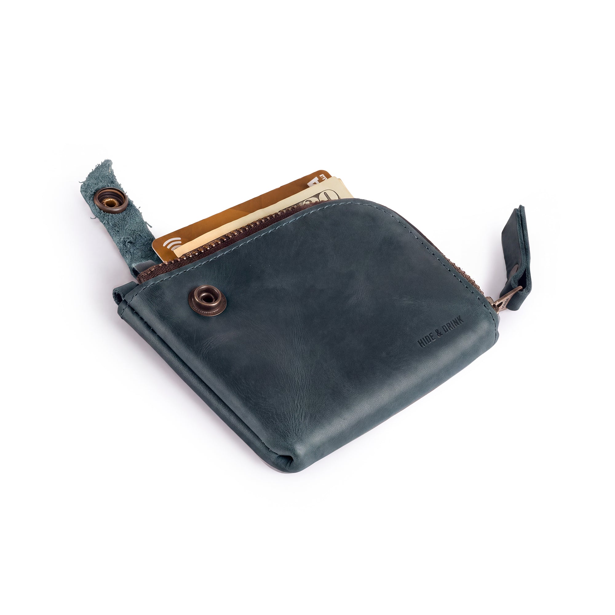 Side view of the blue Lion's Mane Zippered Wallet by Hide & Drink, showcasing its sleek design. Ideal for those looking for a stylish and durable means of organizing their essentials.