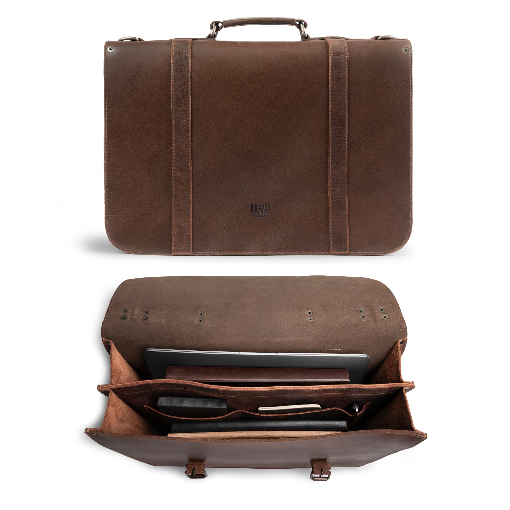Inside view of the Hide & Drink 2-Compartment Thick Messenger Bag, showcasing its spacious design with a laptop compartment. This Rustic Briefcase with Adjustable Shoulder Strap is an ideal Heavy Duty Satchel and travel accessory made from premium Full Grain Leather, emphasizing Artisan craftsmanship with hand-cut and hand-sewn details, produced in La Antigua Guatemala & Oaxaca Mexico.