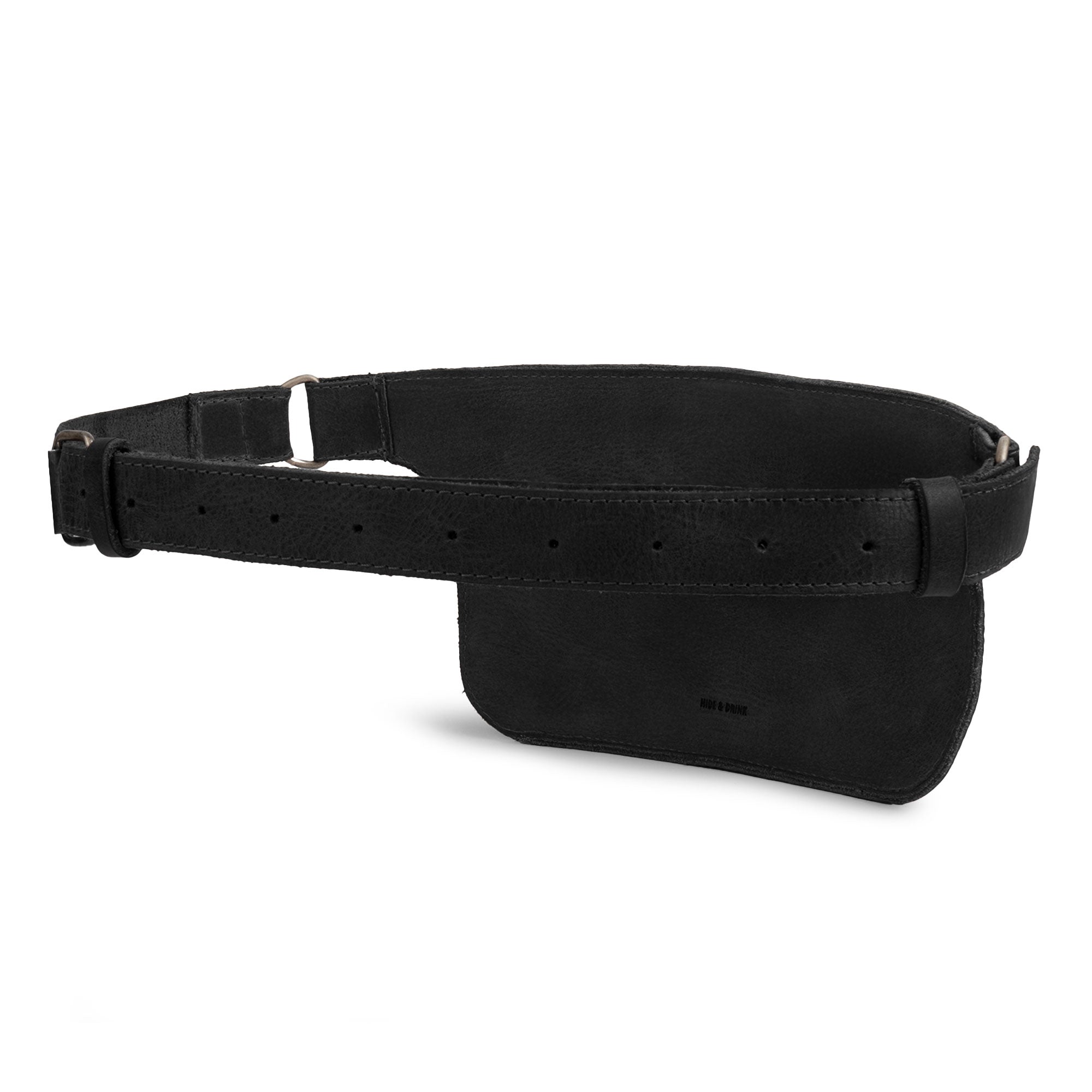 Slim Fanny Pack by Hide & Drink in a side view, emphasizing its adjustable strap and sleek lines, ideal for a phone holder. This artisan-crafted full grain leather fanny pack showcases expert hand stitching from Oaxaca Mexico.