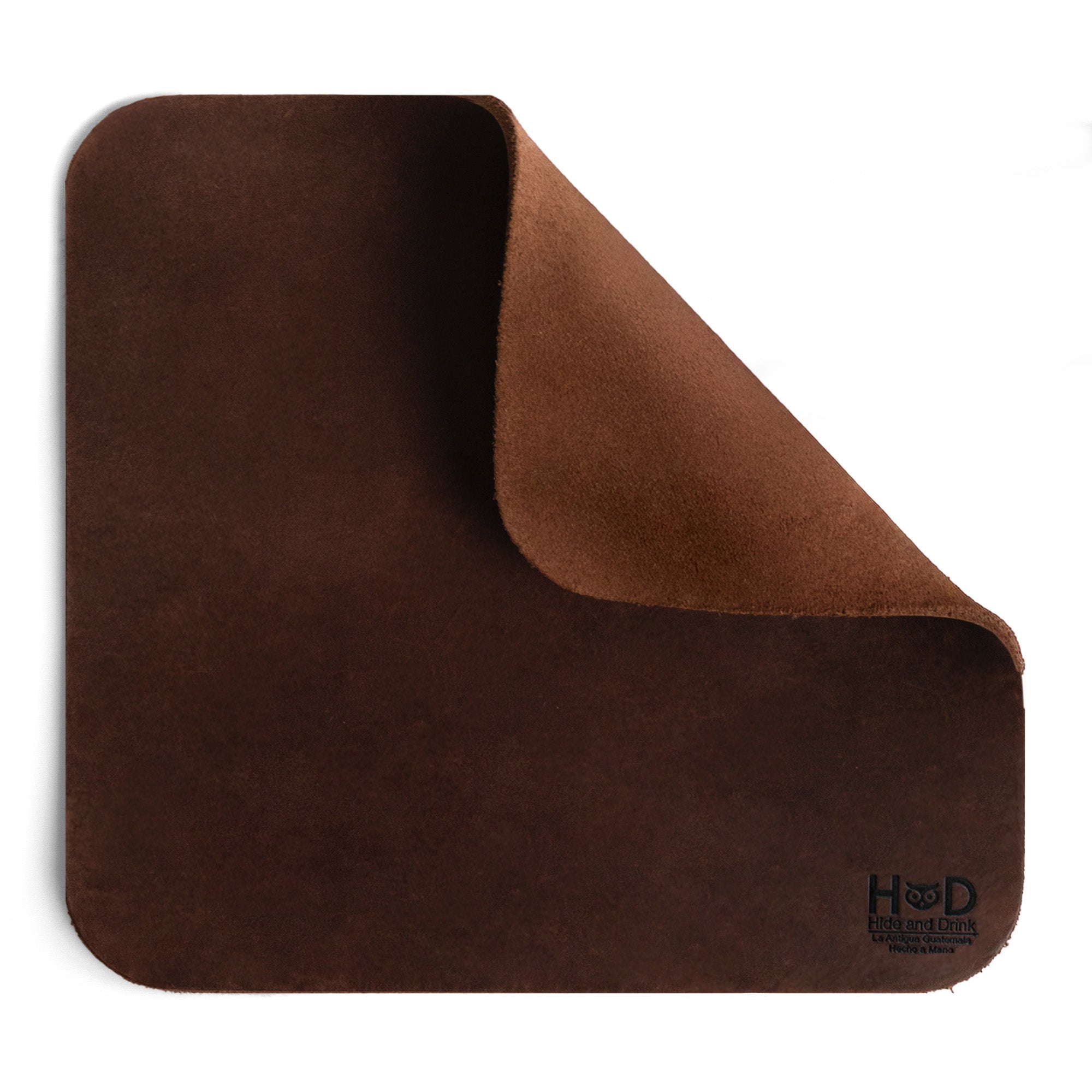 Hide & Drink Mousepad showcasing premium genuine leather. This mousepad features an attractive suede side and is perfect for gamers and professionals alike, providing an ergonomic non-slip base, made by skilled artisans in La Antigua Guatemala & Oaxaca Mexico.