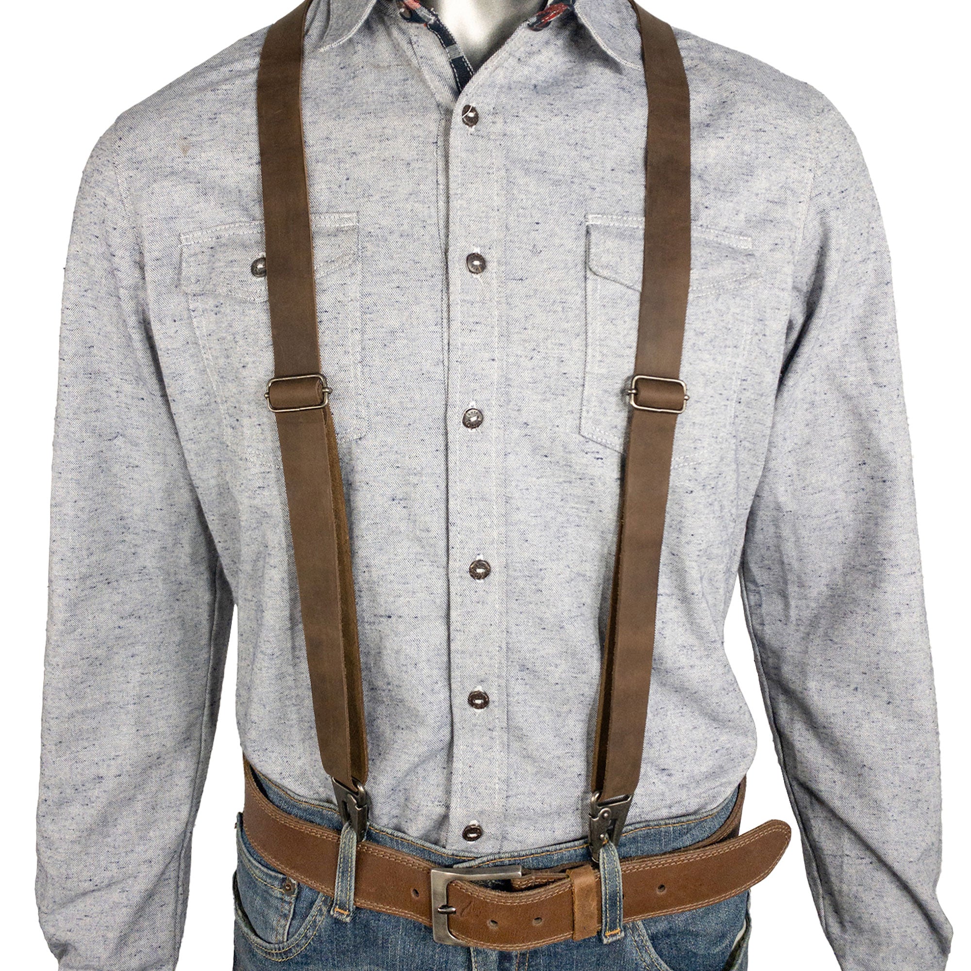 Model showcasing Drop Shaped Suspenders by Hide & Groom, crafted with Full Grain Leather; adjustable size straps for men, perfect for enhancing any outfit with artisan detail, handmade in La Antigua Guatemala & Oaxaca Mexico.