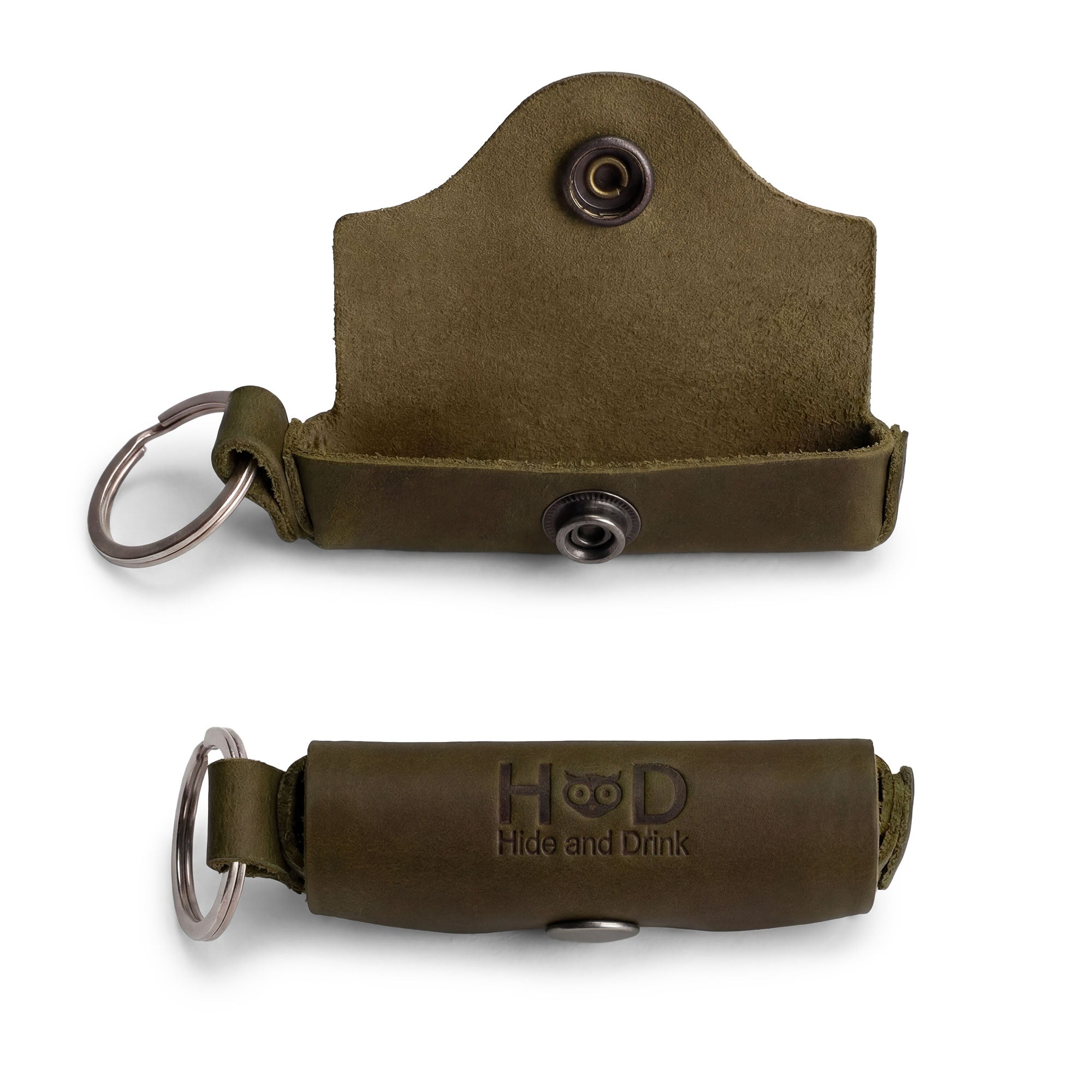 Interior view of the Lip Balm Key Chain from Hide & Drink, showing how the lip balm sits snugly inside. This practical design not only offers lip protection but also features a brass metal clasp for easy attachment to your bag or keys. Made from full grain leather, it's an artisan-crafted accessory that represents classic vintage style, handmade in La Antigua Guatemala & Oaxaca Mexico.