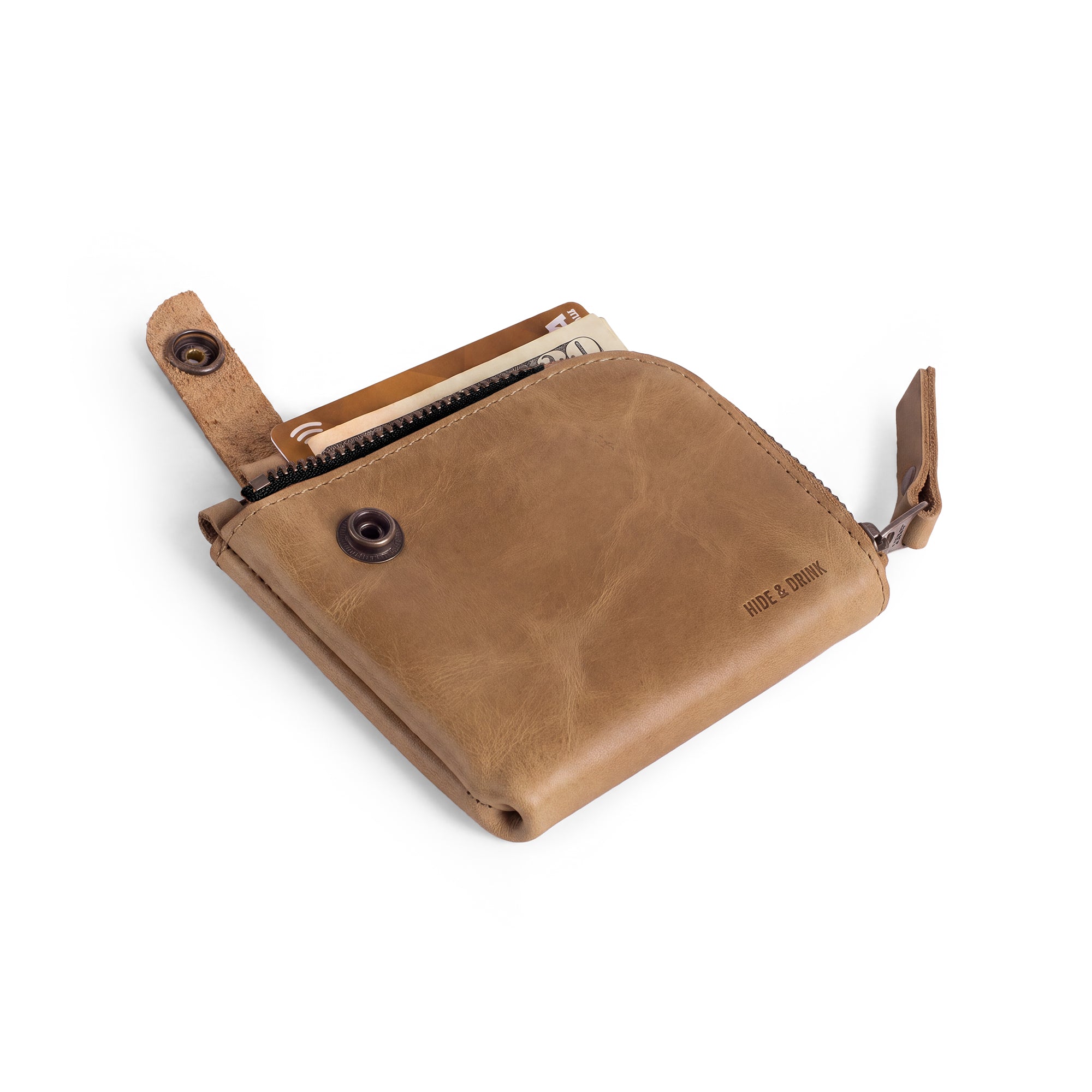 Lion's Mane Zippered Wallet by Hide & Drink demonstrating its ability to hold essentials comfortably, making it a great choice for daily use.
