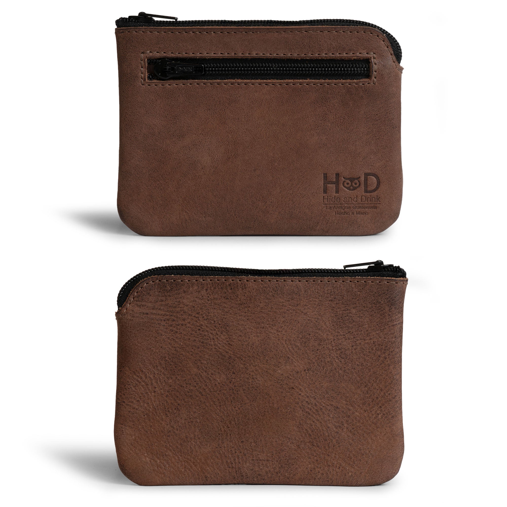 Showcasing the Double Wallet Coin Pouch by Hide & Drink, this image highlights the sleek design and practical zipper feature crafted from Full Grain Leather. Ideal for organizing essentials, it represents small batch production, hand cut and hand sewn quality, with a fire branded finish, handmade in La Antigua Guatemala & Oaxaca Mexico.