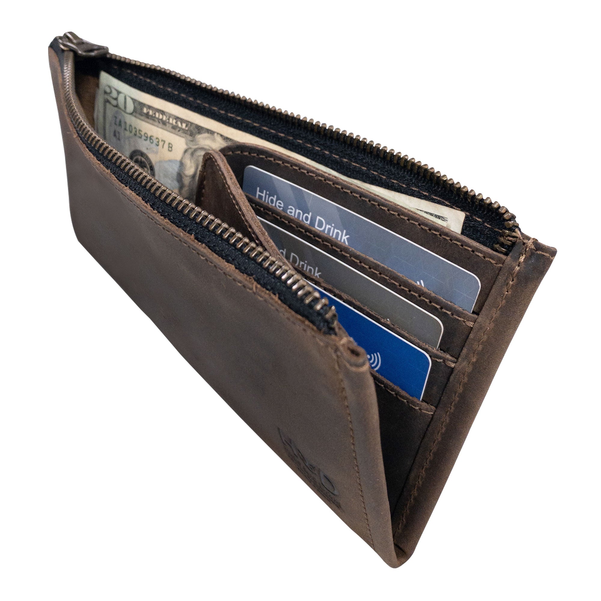 Hide & Drink Zipper Wallet opened to reveal inner compartments for cards and cash. This stylish zippered bag serves as a Rectangular Wallet with Inner Card Slots, crafted from Full Grain Leather. Ideal as a Rustic Card Holder and Travel Accessory, it embodies Small Batch Production, Hand Cut, and Hand Sewn details from stockyardX, showcasing Artisan craftsmanship. Handmade in La Antigua Guatemala & Oaxaca Mexico.