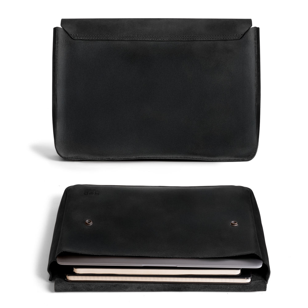 Stylish display of Hide & Drink's Vintage Folder Holder highlighting its exquisite Handmade Leather. This Document Holder combines vintage envelope aesthetics with Full Grain Leather construction, showcasing the excellence of Small Batch Production from La Antigua Guatemala & Oaxaca Mexico.