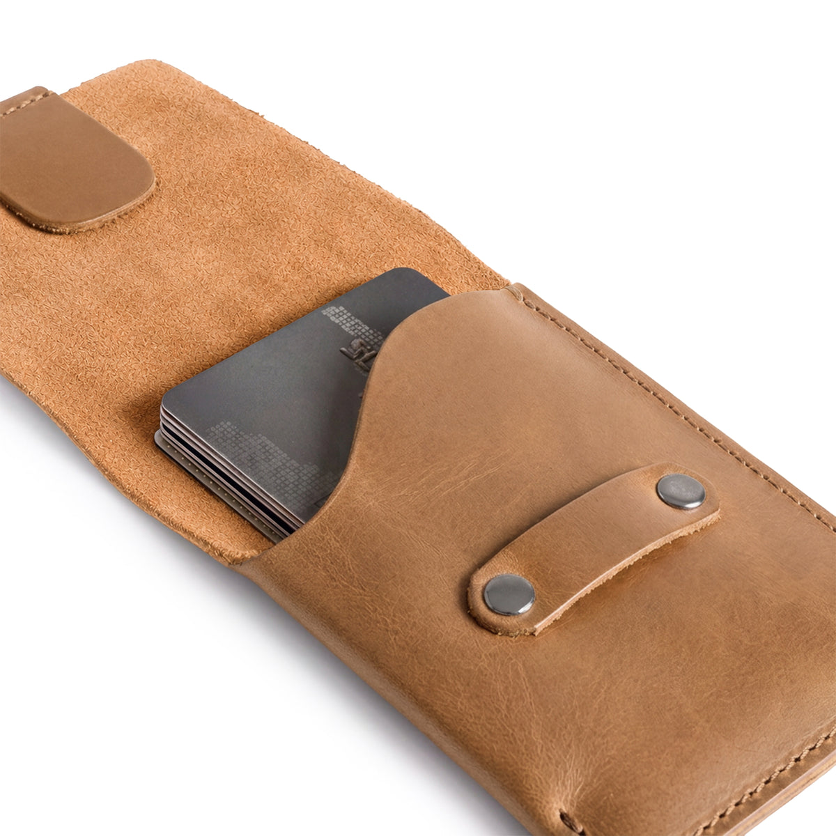 Hide & Drink Slim Card Holder showing functionality with cards and cash, ideal for everyday use. Made from full grain leather, this artisan piece is handcrafted in La Antigua Guatemala, perfect as a durable double storage pocket wallet.