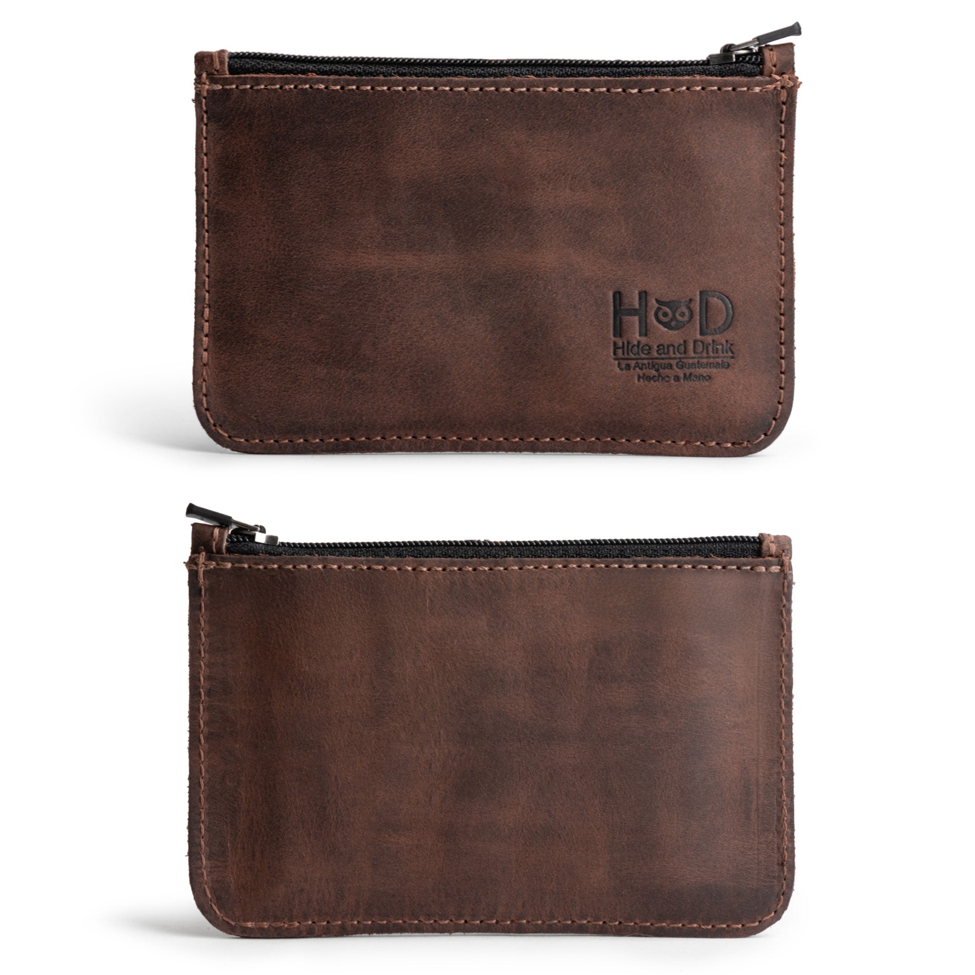 Two angles of the Hide & Drink Zippered Wallet, highlighting its versatility with a sleek design made from Full Grain Leather. This wallet serves as an excellent coin organizer, card case, and folded bills storage, crafted by artisans in La Antigua Guatemala & Oaxaca Mexico.