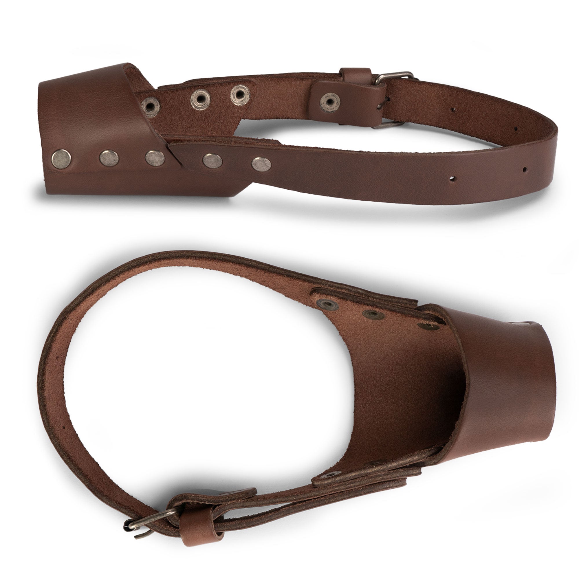 Showcasing the Riveted Dog Muzzle by Hide & Drink, this image highlights a durable design that secures your dog while preventing biting and chewing. Crafted from full grain leather, this muzzle guard is suitable for all breeds, including Pitbulls and German Shepherds, and is handmade in La Antigua Guatemala & Oaxaca Mexico.