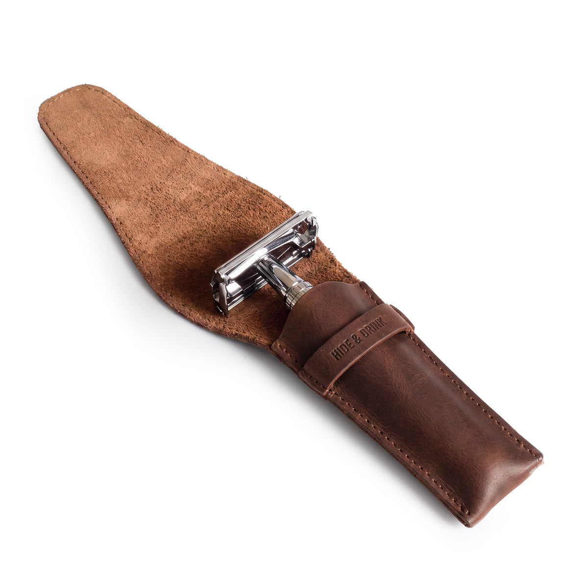 Close-up of the Safety Razor Case by Hide & Drink, showcasing the interior designed to protect your razor while traveling. This Full Grain Leather case exemplifies artisan craftsmanship, making it a unique addition to any personal care routine.