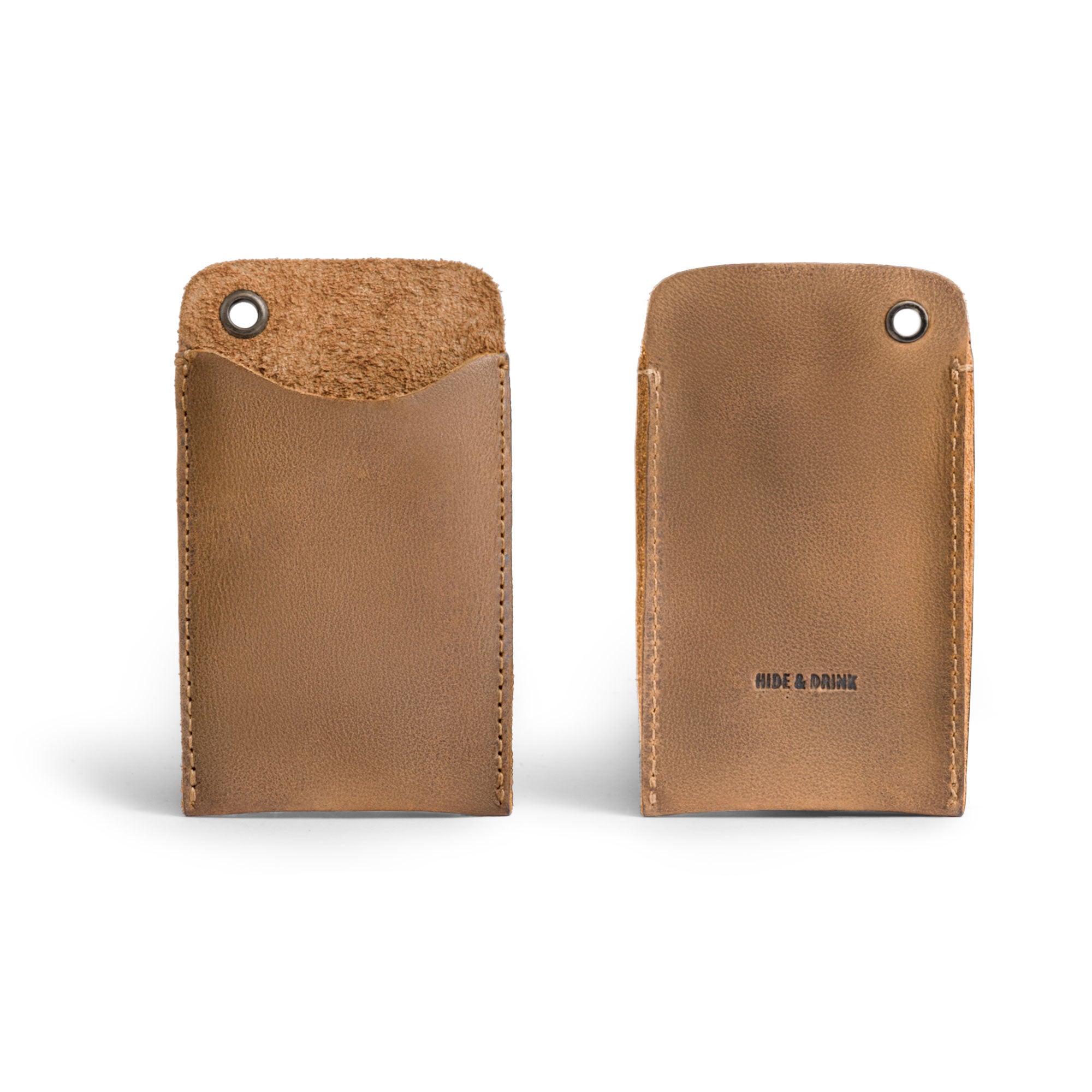 A close-up of Hide & Drink's Multitool Pocket Sleeve EDC in brown leather, designed for durability and style. This small tool organizer is handcrafted and fire branded, showcasing the high-quality craftsmanship from La Antigua Guatemala.