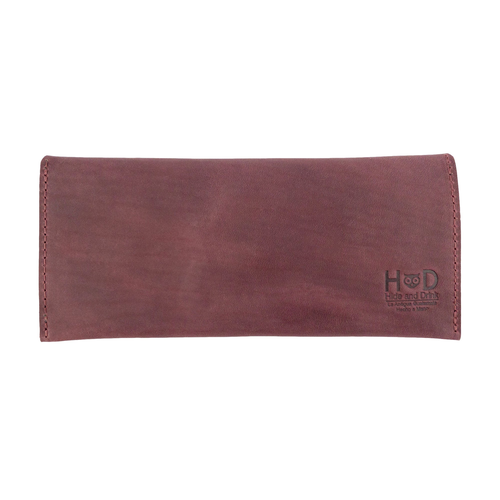 Back view of the earthy Long Utility Pouch by Hide & Drink, showcasing its durable full grain leather construction. A perfect wallet for everyday essentials.