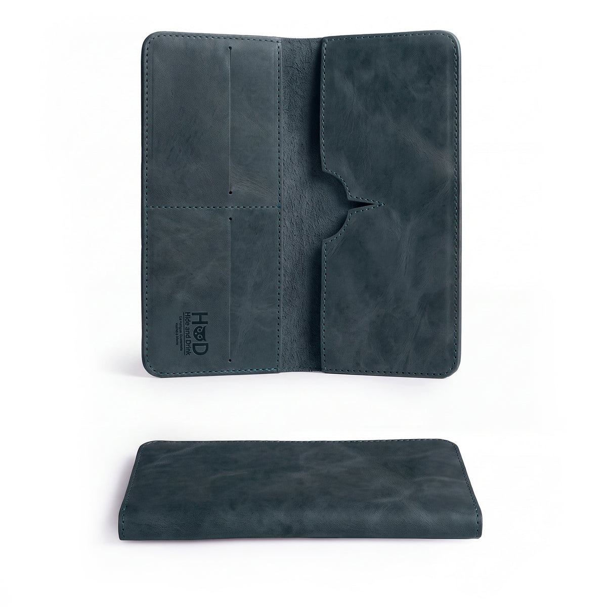Open bifold wallet for cellphone by Hide & Drink, showing card slots and a pocket for cash. This functional Bifold Wallet for Cellphone is crafted from Full Grain Leather, combining elegance with utility. Handcrafted in small batches by skilled artisans in La Antigua Guatemala & Oaxaca Mexico.