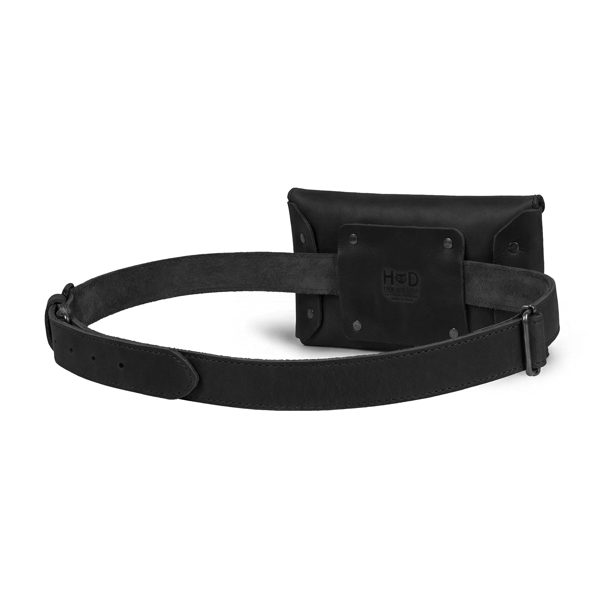 Functional back view of Hide & Drink's Fancy Fanny Pack, highlighting the durable strap and fastening. Perfect as a waist pouch or stylish vintage purse, this fanny pack is made from full grain leather and showcases small batch production, handcrafted in La Antigua Guatemala.