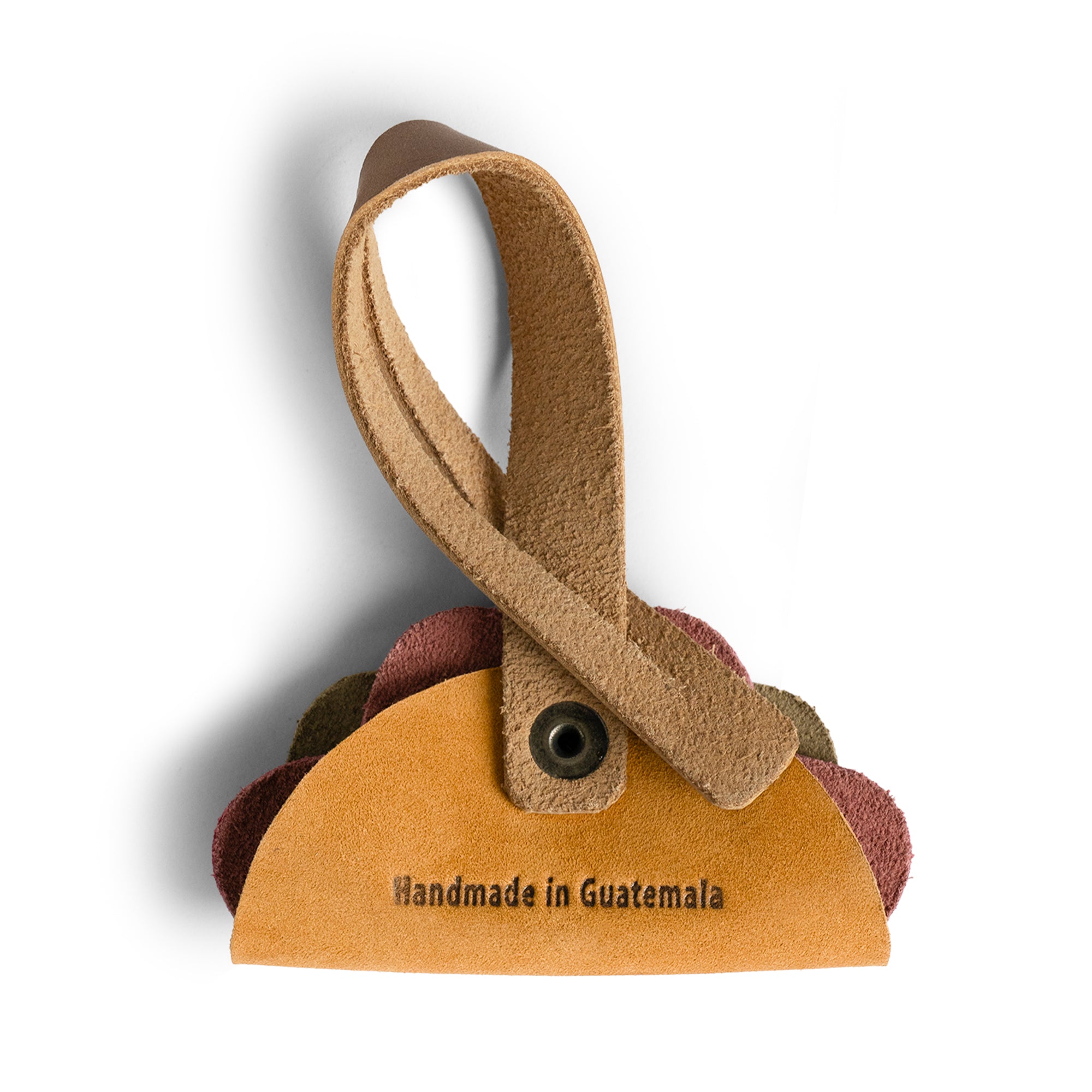 Bag Charms by Austin Genuine includes a hamburger charm labeled 'Handmade in Guatemala.' This Austin Genuine Bag Charm showcases 7 unique designs made with full grain leather from StockyardX, crafted through small batch production, hand cut, hand sewn, and fire branded, artisan, handmade in La Antigua Guatemala & Oaxaca Mexico.