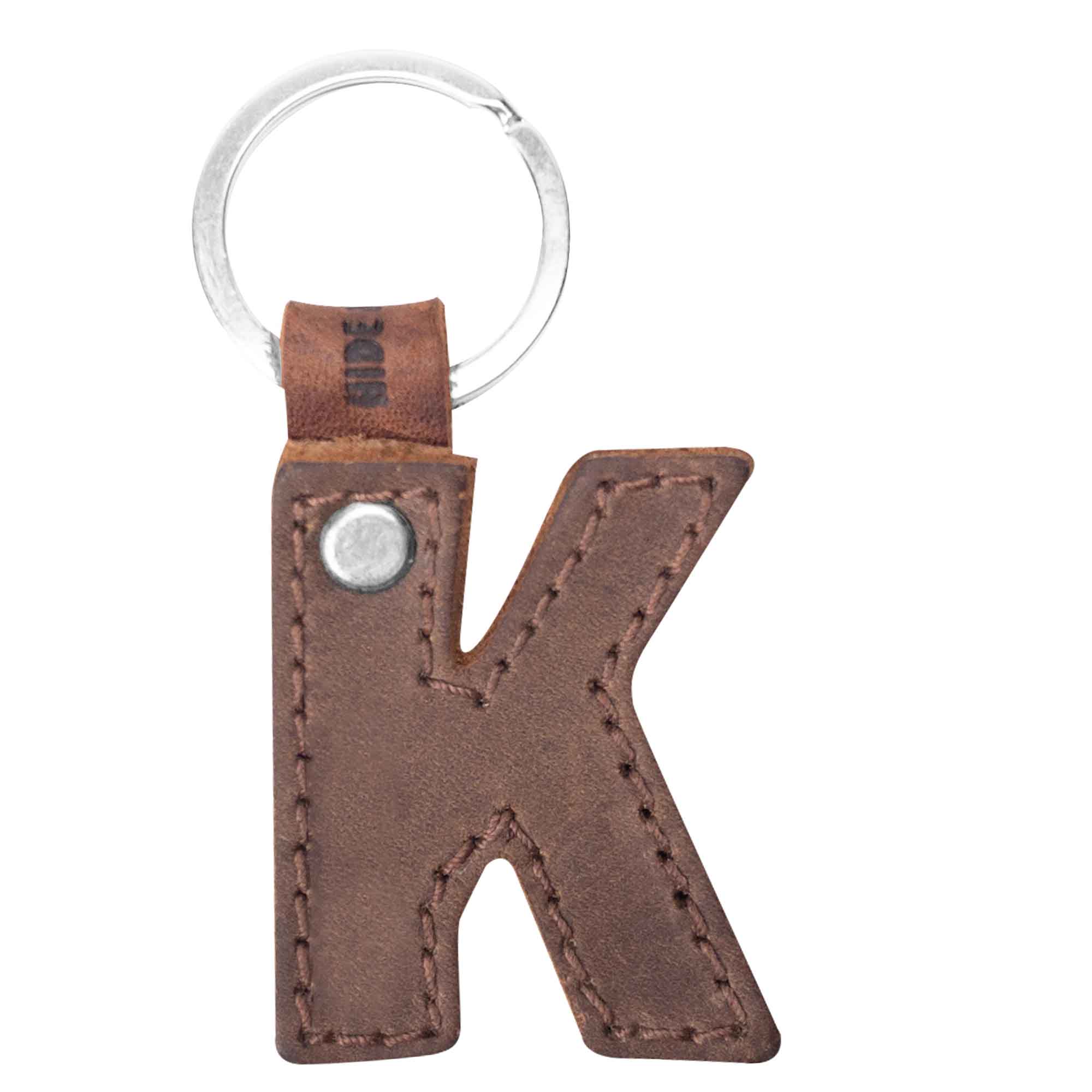 Unique 'P' thick leather Alphabet Letter Keychain from Hide & Drink, perfect for stylish key organization. Artisan crafted in La Antigua Guatemala for quality and durability.