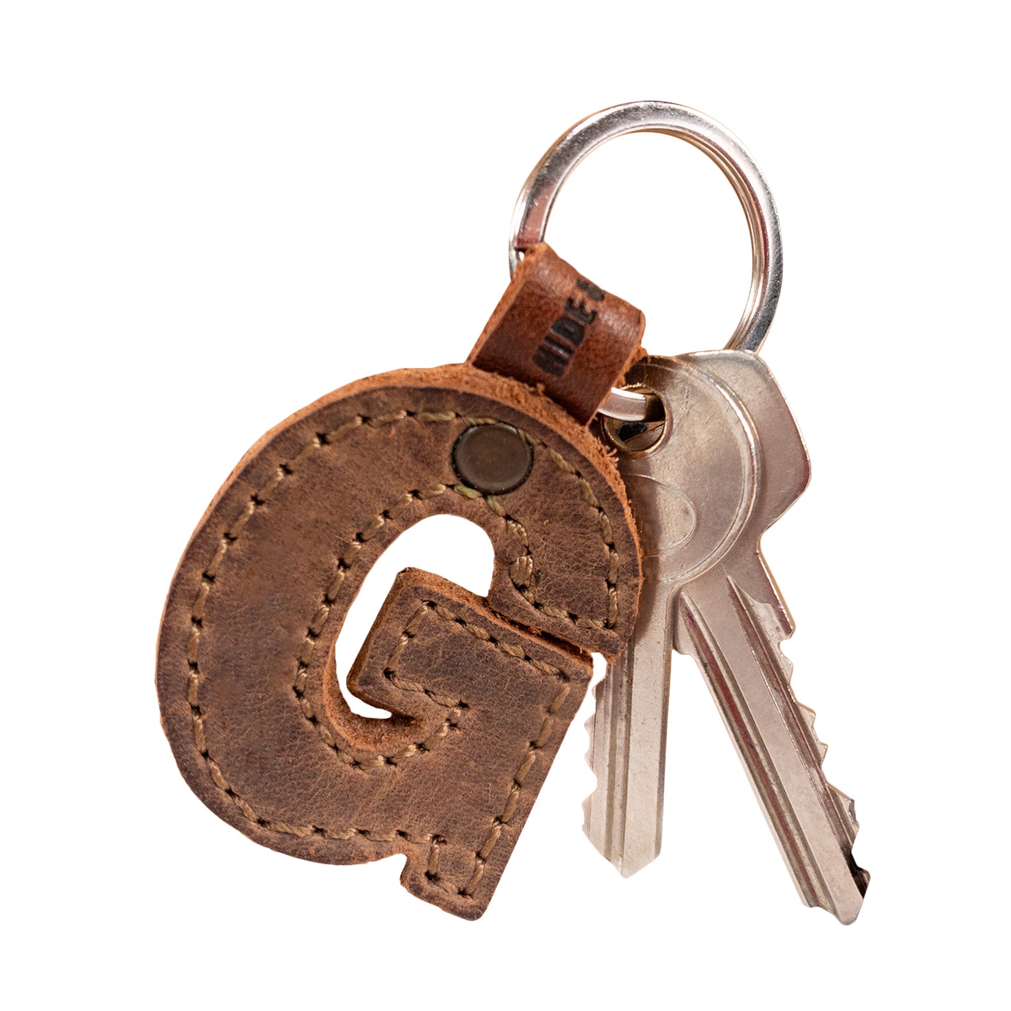 Unique 'H' thick leather Alphabet Letter Keychain from Hide & Drink, ensuring durability and stylish flair. Handmade in La Antigua Guatemala by skilled artisans.