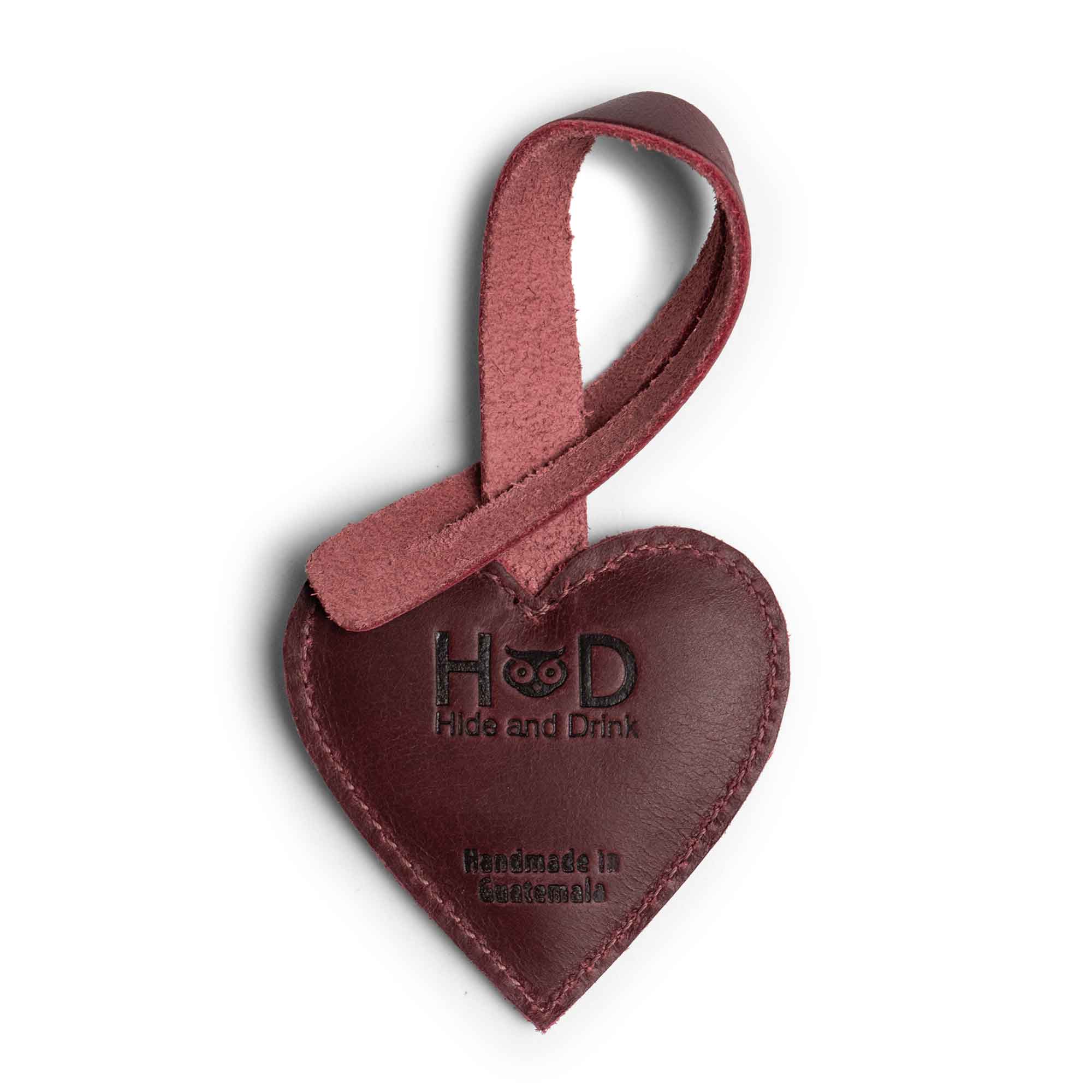 Hide & Drink Bag Charms displaying a charming moose design, perfect charm for handbags. Ideal as a purse charm for tote & backpacks crafted from high-quality full grain leather. Each piece embodies StockyardX's small batch production methods, highlighting hand cut, hand sewn artistry and fire branding, handmade in La Antigua Guatemala & Oaxaca Mexico.