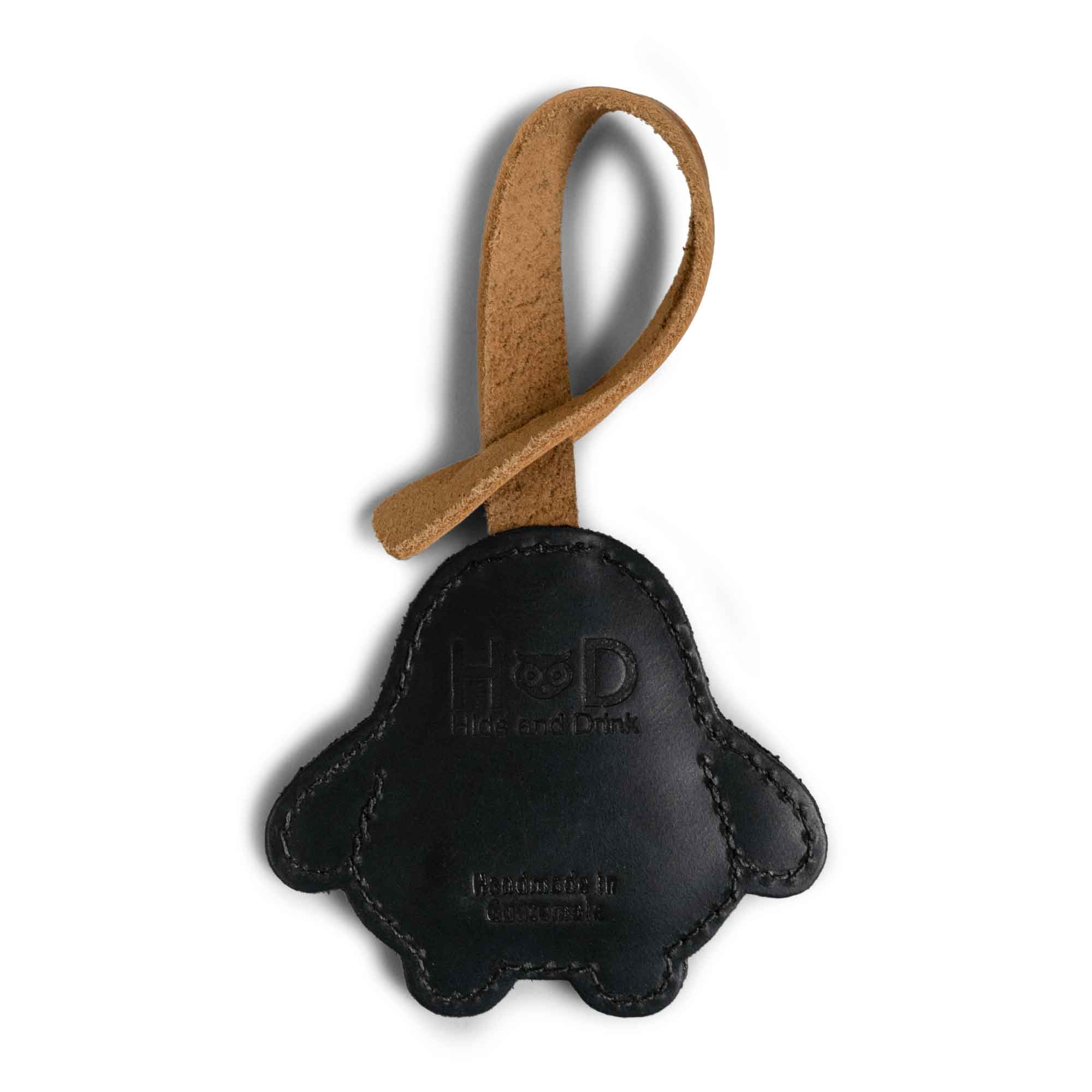 Hide & Drink Bag Charms displaying a lovely heart design, an ideal charm for handbags. This accessory functions well as a purse charm for tote & backpacks crafted from high-quality full grain leather. Each piece embodies StockyardX's small batch production ethos, showcasing hand cut, hand sewn artistry and fire branding, handmade in La Antigua Guatemala & Oaxaca Mexico.