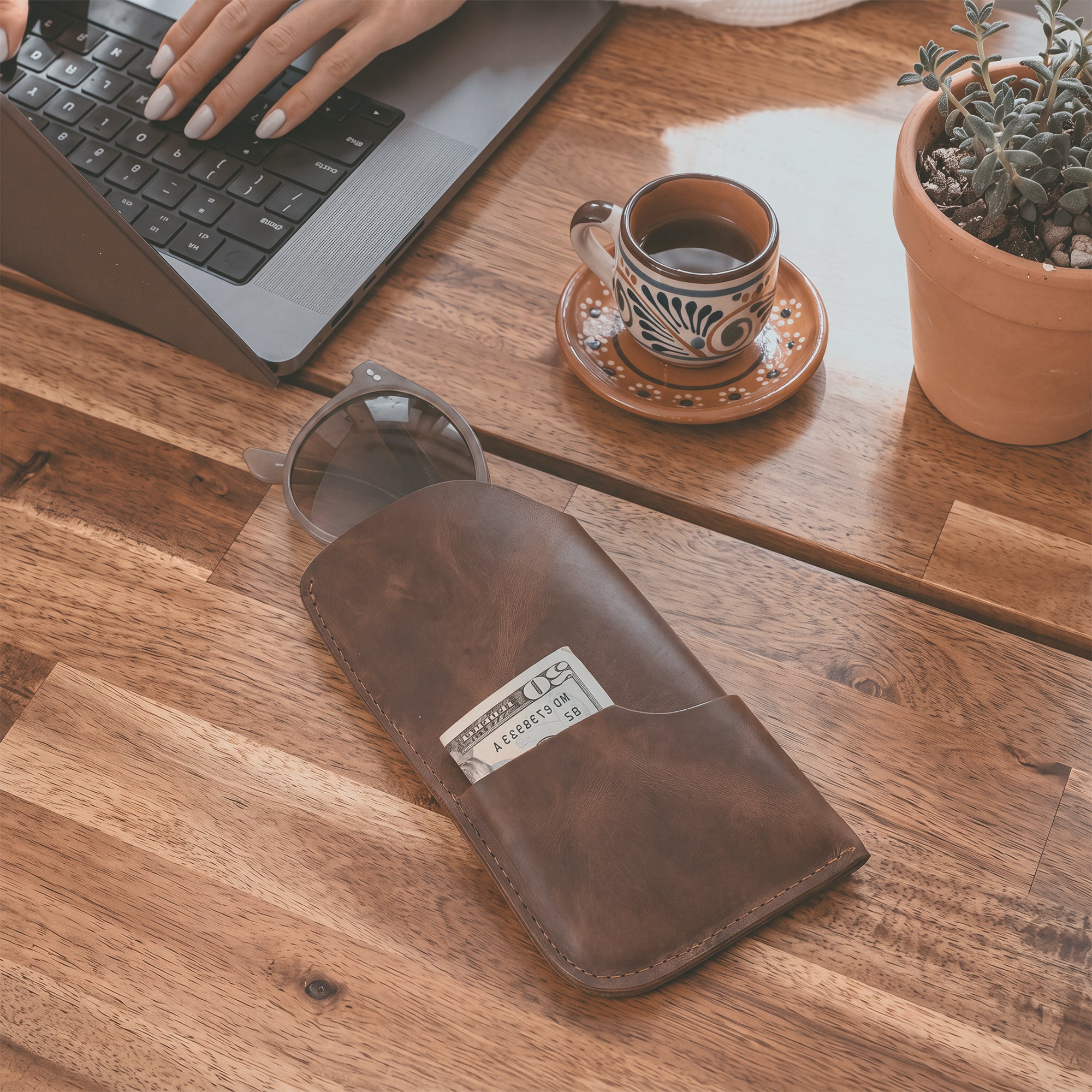 Profile shot of the Hide & Drink Sunglass Case & Wallet, showcasing its elegant design. This Rustic Sunglasses Case & Wallet embraces the quality of Full Grain Leather and serves as a reliable eyeglasses sleeve for travel, proudly handmade in La Antigua Guatemala & Oaxaca Mexico.