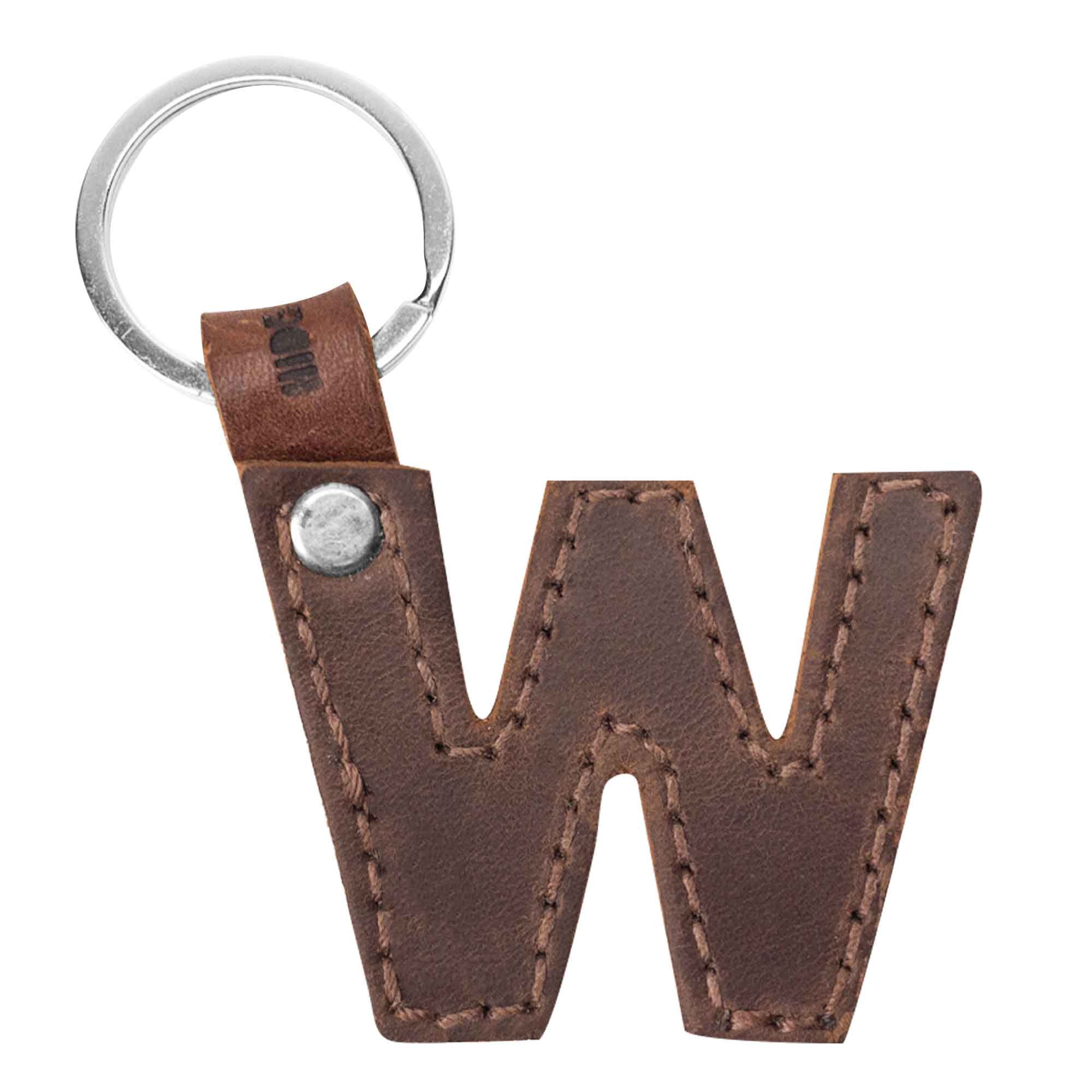 Close-up of letter W in a leather keychain by Hide & Drink. This durable Alphabet Letter Keychain made from Full Grain Leather emphasizes the artisan methods typical of small batch production in La Antigua Guatemala.