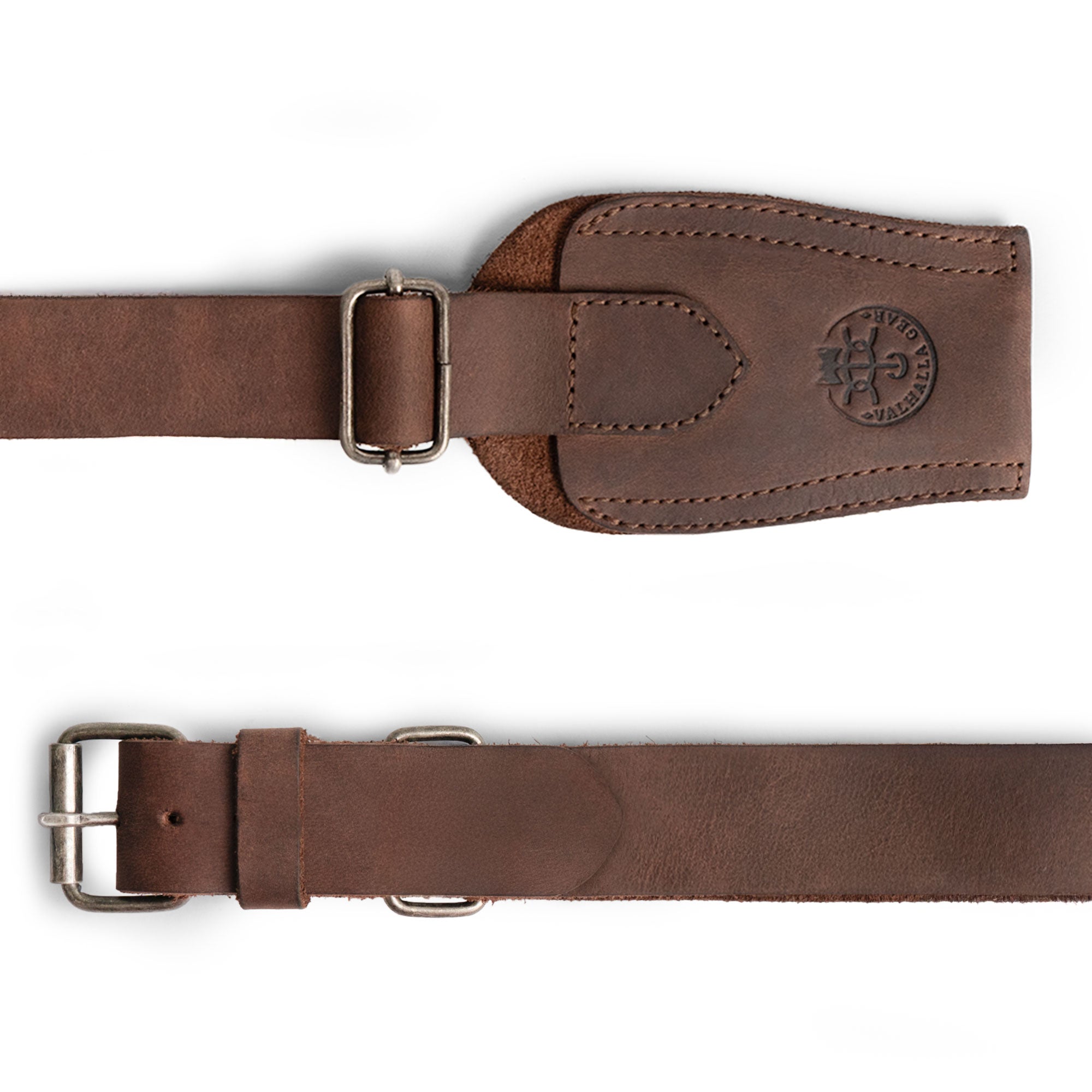 Close-up view of the Archery Bow Sling from Valhalla Gear, showcasing the leather's rich texture and quality. This bow carrier features a practical design for hunters and archers alike. Archery Bow Shoulder Strap, Sling, Bow Carrier, Hunting & Practice, Full Grain Leather, StockyardX, Small Batch Production, Hand Cut, Hand Sewn, Fire Branded, Artisan, Handmade in La Antigua Guatemala & Oaxaca Mexico.