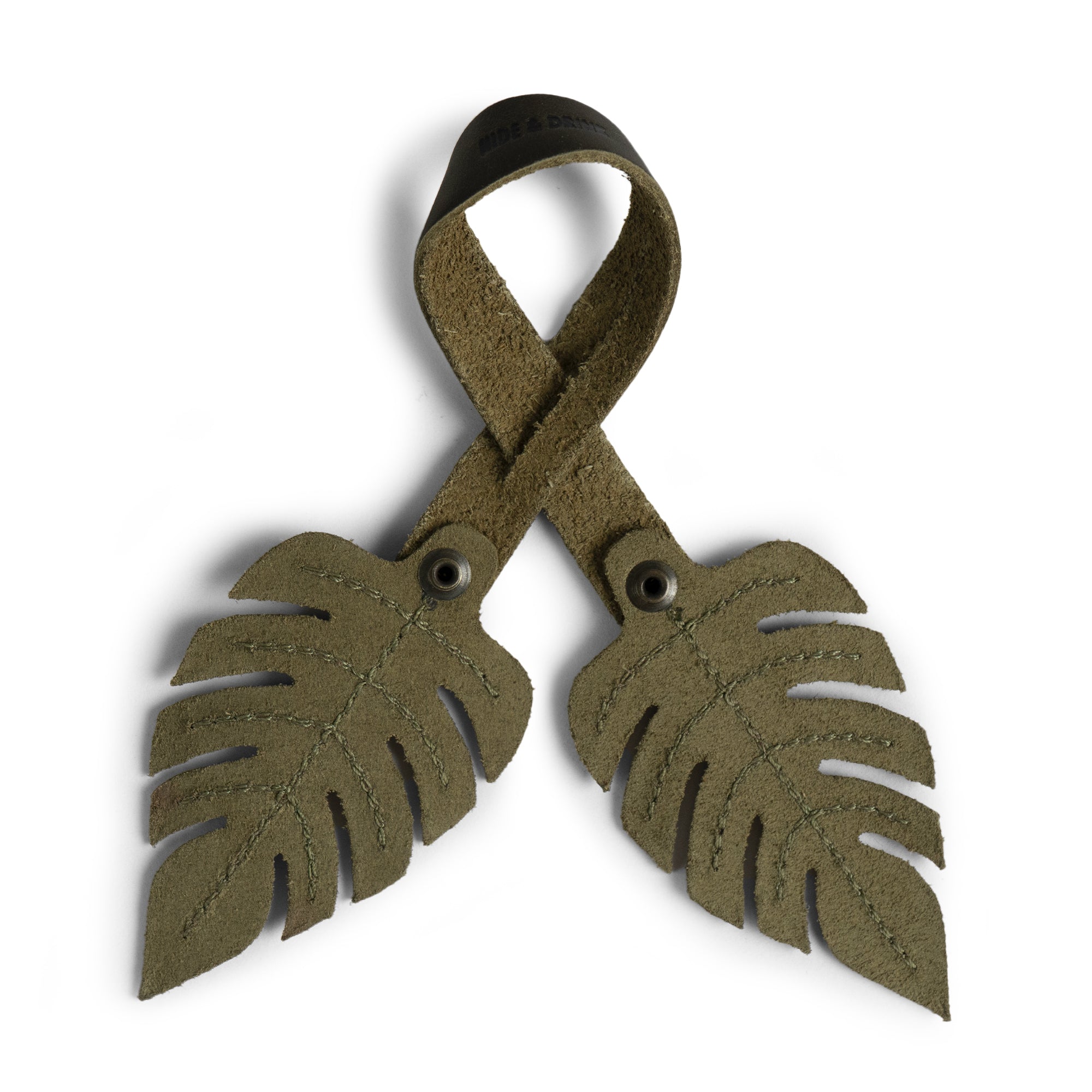 Hide & Drink Bag Charms displaying an engaging bird design, perfect charm for handbags. Ideal as a purse charm for tote & backpacks crafted from high-quality full grain leather. Each piece embodies StockyardX's focus on small batch production, highlighting hand cut, hand sewn craftsmanship and fire branding, handmade in La Antigua Guatemala & Oaxaca Mexico.