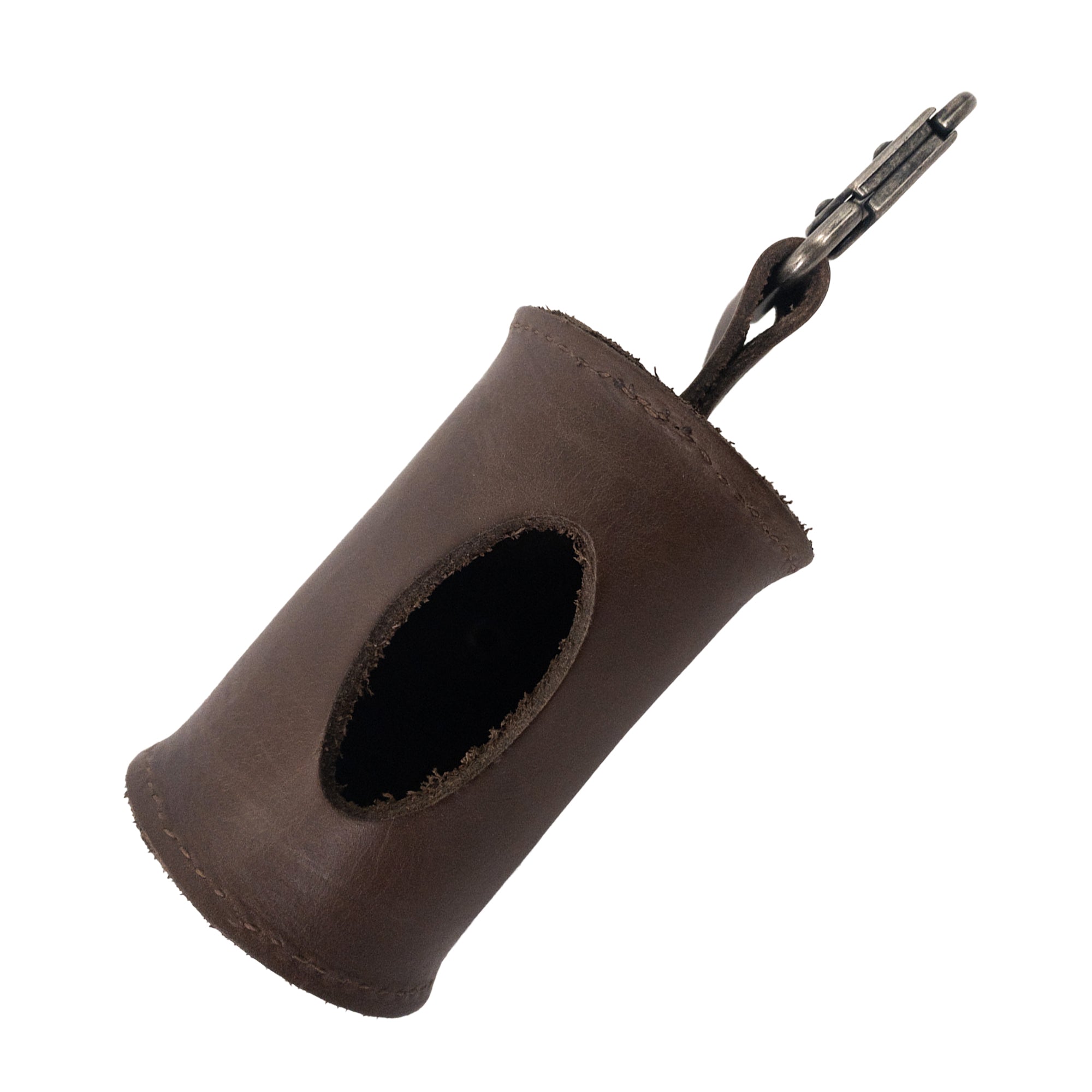 A side view of the Hide & Drink Doggie Bag Dispenser, designed from thick full grain leather and featuring a brass metal clip for convenient attachment to belts or leashes. This stylish waste bag holder is handcrafted by artisans in La Antigua Guatemala.