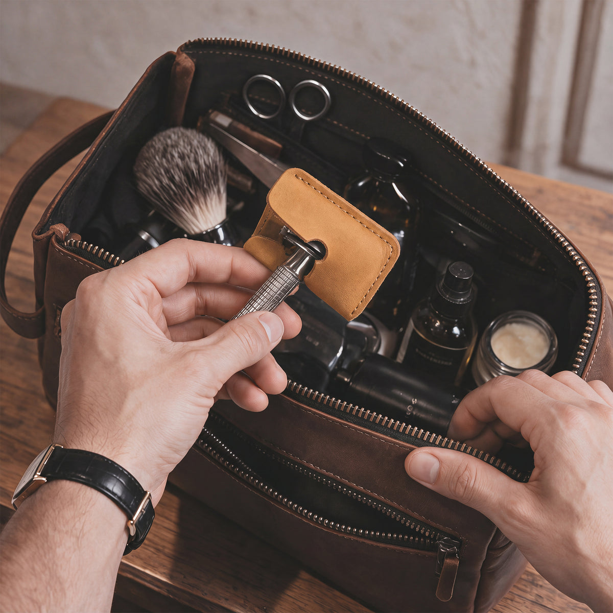Hide & Drink Razor Head Cover displayed with a full grain leather protective sheath for Double Edge Safety Razor Head, showcasing artisan craftsmanship from La Antigua Guatemala. This shaving travel cover is hand cut, hand sewn, and fire branded.