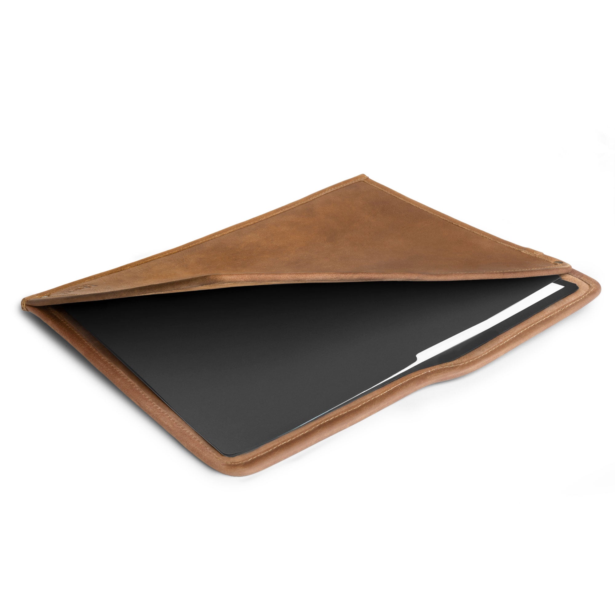 An open view of the tan Manila Folder by Hide & Drink, designed to hold important documents. This Document Holder, made from premium Full Grain Leather, showcases the art of Small Batch Production and the skills of artisans in La Antigua Guatemala and Oaxaca Mexico.