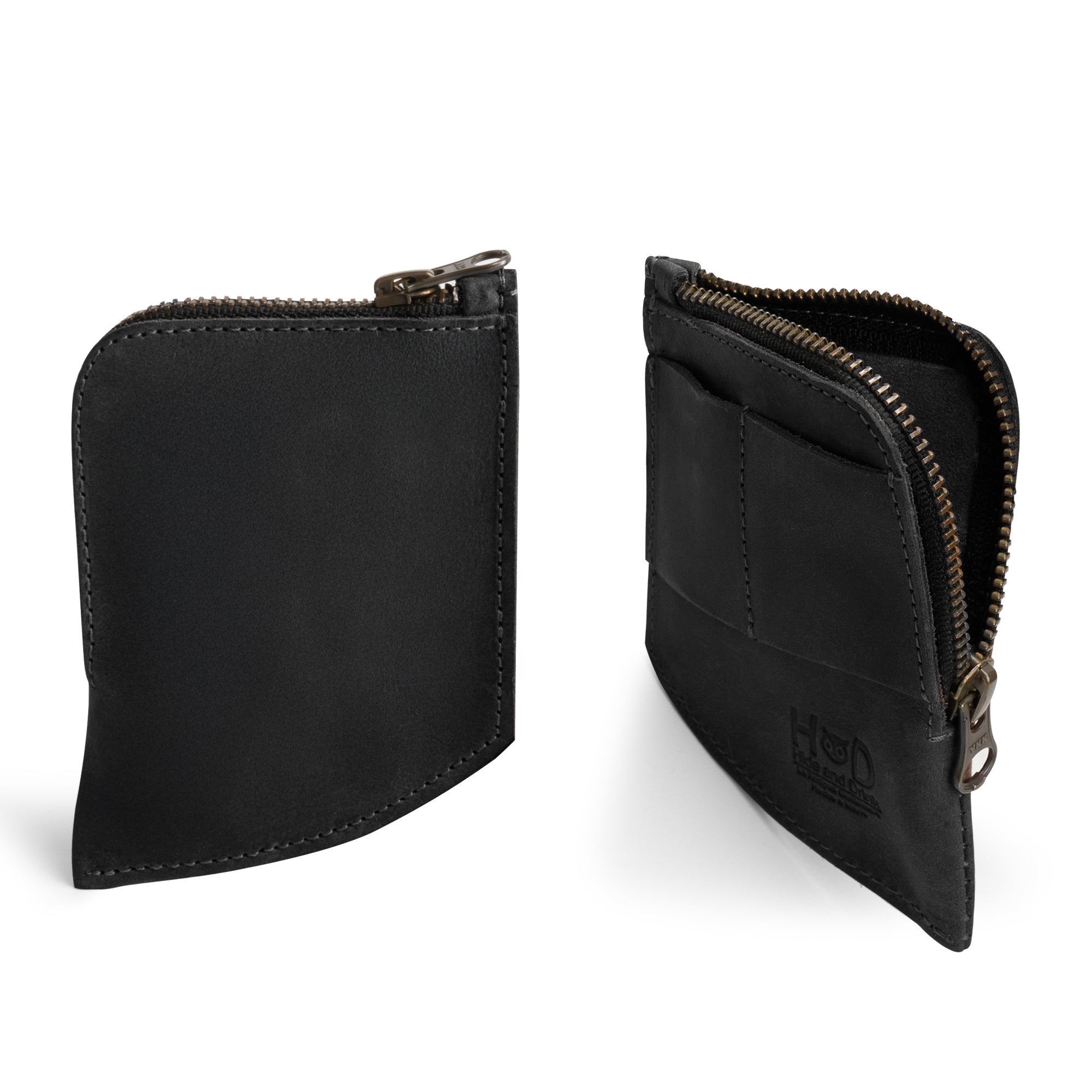 Hide & Drink EDC Pocket Wallet in black, representing style and practicality. Handcrafted with fire branded details, this wallet functions as a slim front card holder and is ideal for organized carrying.