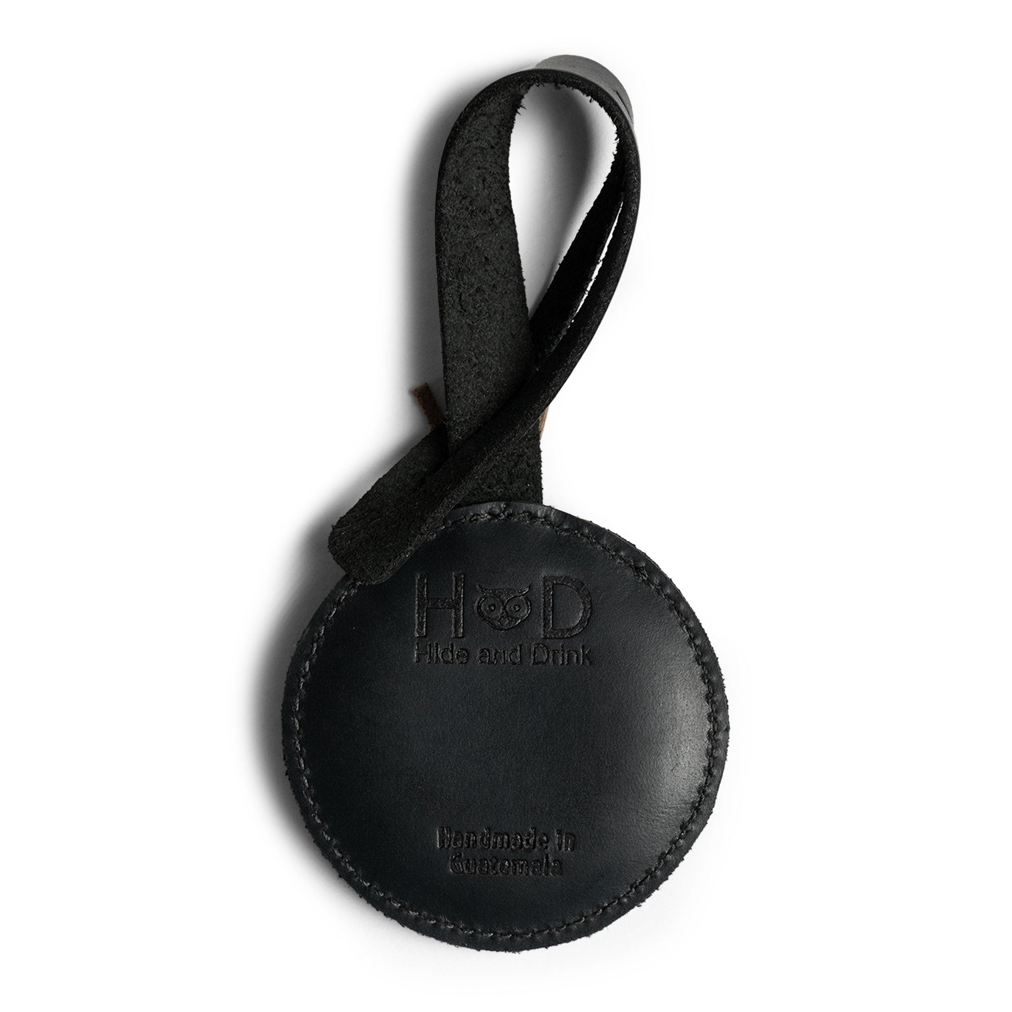 Hide & Drink Bag Charms showcasing a unique pineapple design, perfect charm for handbags. This purse charm for tote & backpacks crafted from premium full grain leather signifies StockyardX's small batch production methods. Each piece highlights hand cut, hand sewn craftsmanship and fire branding, handmade in La Antigua Guatemala & Oaxaca Mexico.