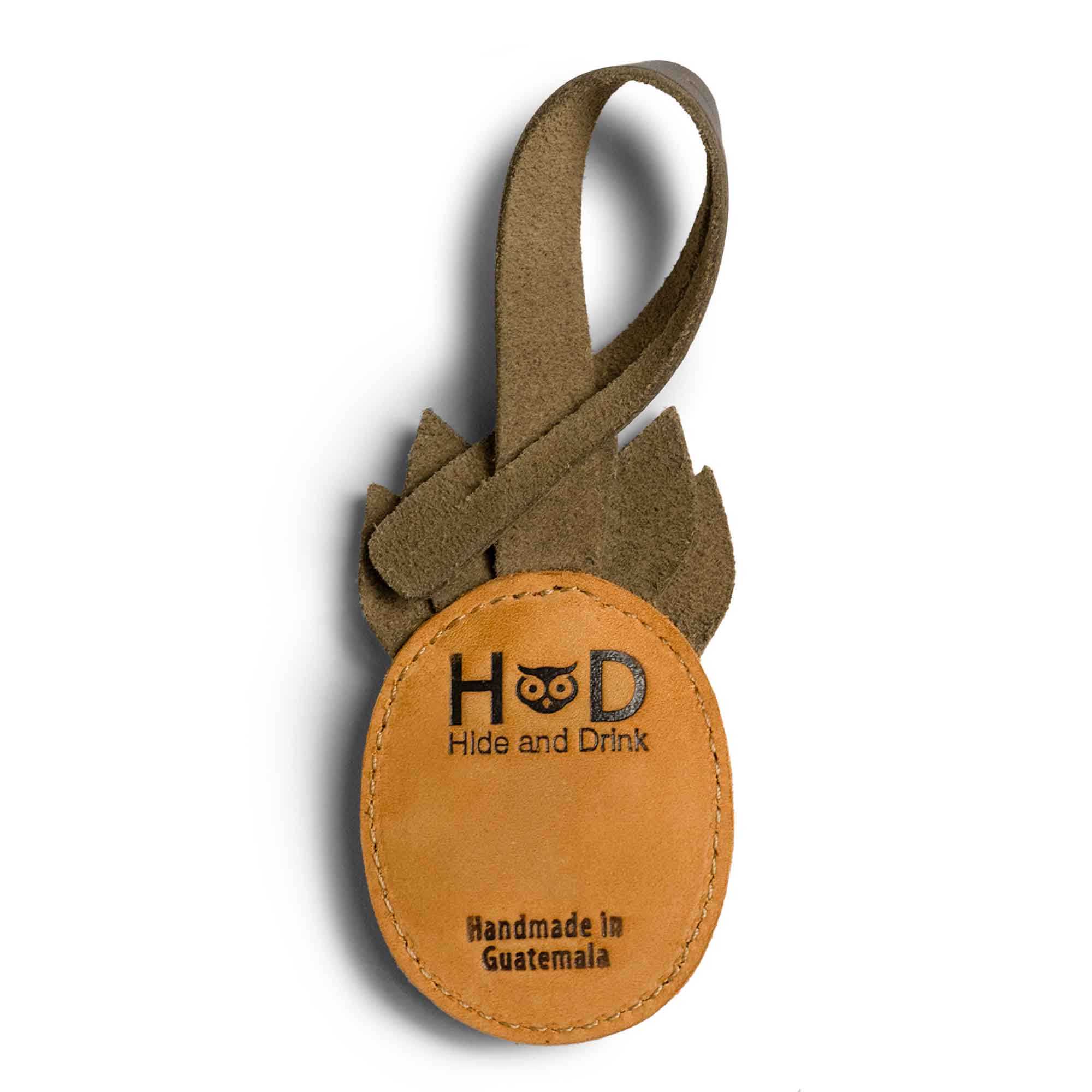 Hide & Drink Bag Charms displaying a beautiful leaf design, ideal charm for handbags. This purse charm for tote & backpacks made from durable full grain leather signifies StockyardX's focus on small batch production methods. Each piece captures hand cut, hand sewn artistry combined with fire branding, handmade in La Antigua Guatemala & Oaxaca Mexico.