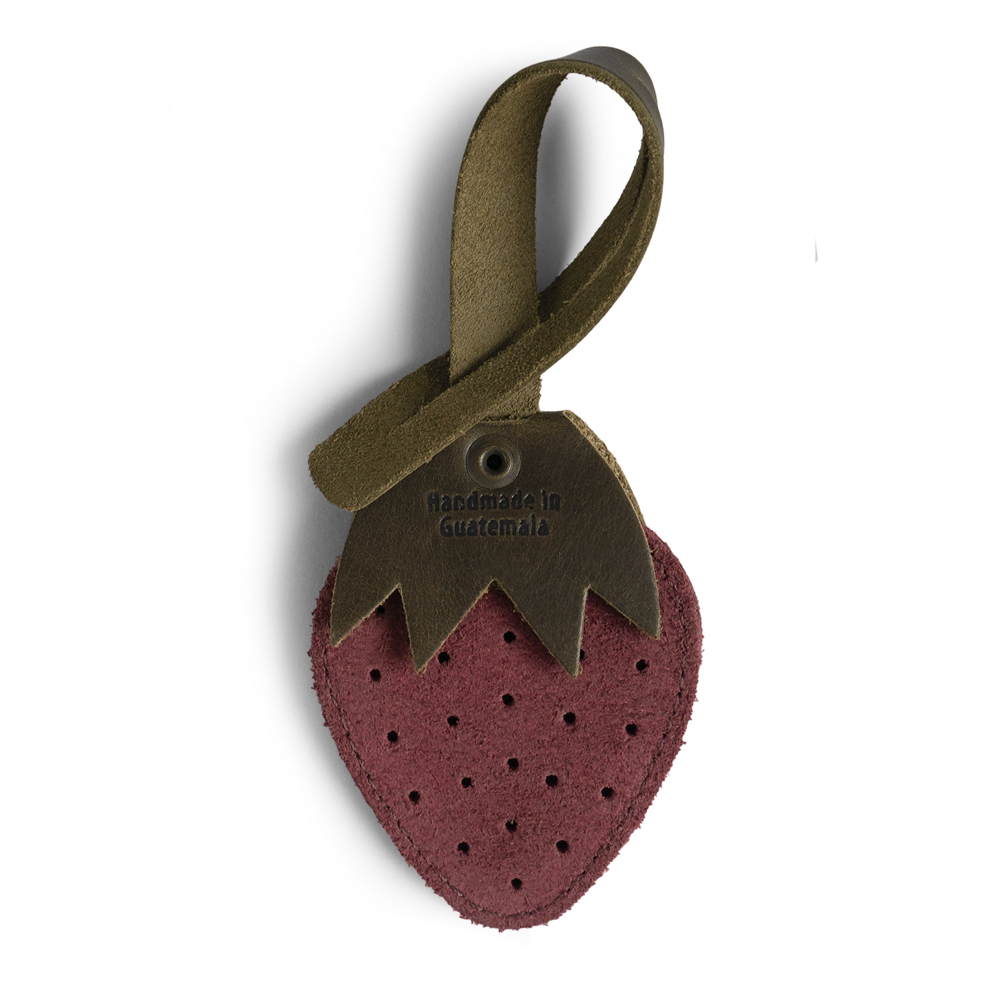 Hide & Drink Bag Charms displaying a unique bat design, ideal charm for handbags. This purse charm for tote & backpacks made from durable full grain leather signifies StockyardX's commitment to small batch production. Each piece reflects hand cut, hand sewn craftsmanship and fire branding, handmade in La Antigua Guatemala & Oaxaca Mexico.
