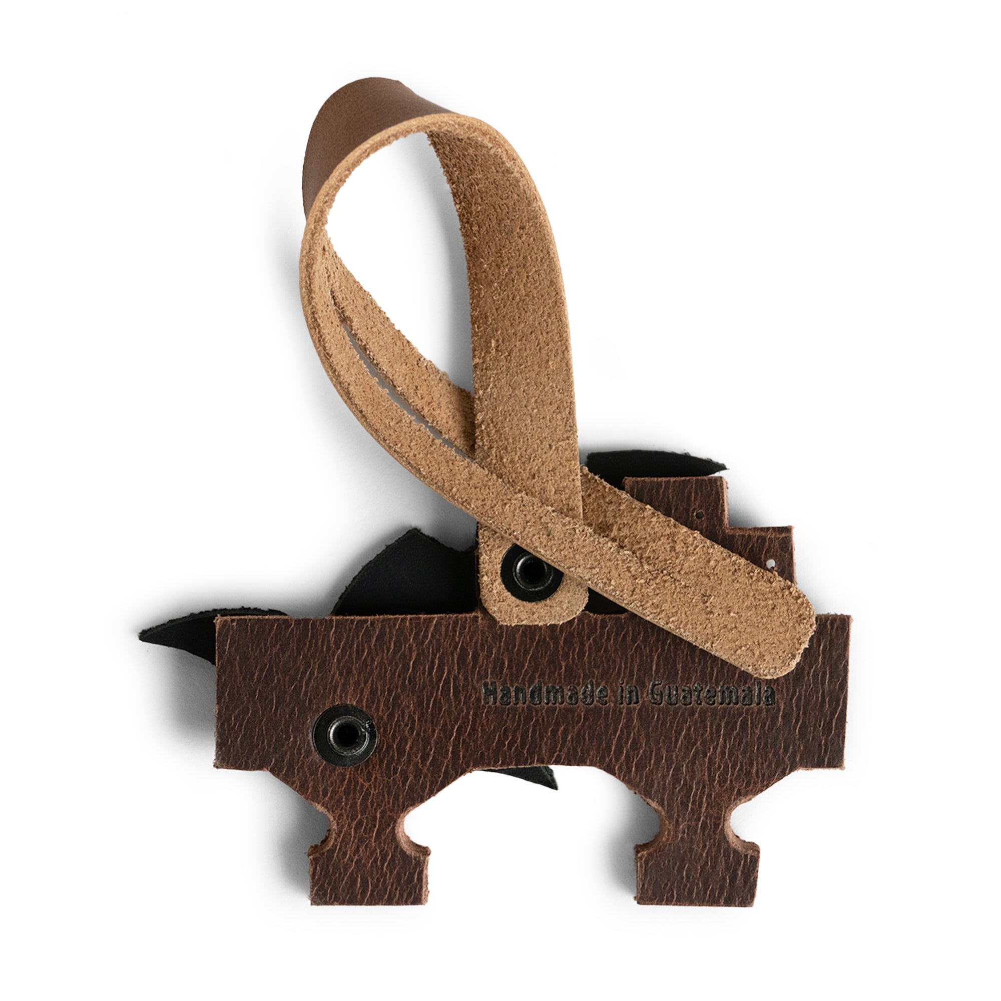 Bag Charms by Austin Genuine displays a bat charm labeled 'Handmade in Guatemala.' This Austin Genuine Bag Charm showcases 7 unique designs made with full grain leather from StockyardX, crafted through small batch production, hand cut, hand sewn, and fire branded, artisan, handmade in La Antigua Guatemala & Oaxaca Mexico.