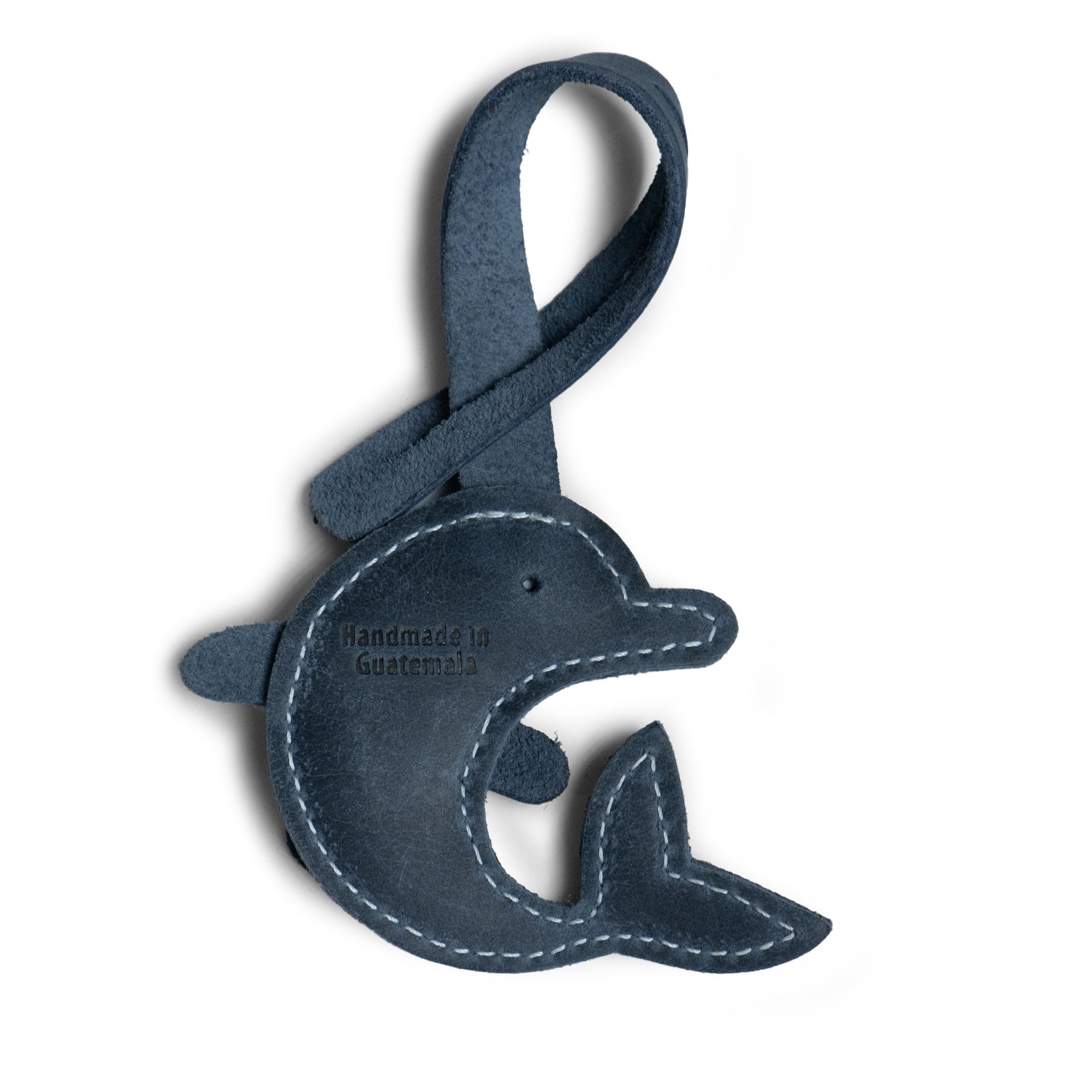 Hide & Drink Bag Charms displaying a unique monster design, ideal charm for handbags. This purse charm for tote & backpacks crafted from premium full grain leather signifies StockyardX's small batch production ethos. Each piece showcases hand cut, hand sewn craftsmanship and fire branding, handmade in La Antigua Guatemala & Oaxaca Mexico.