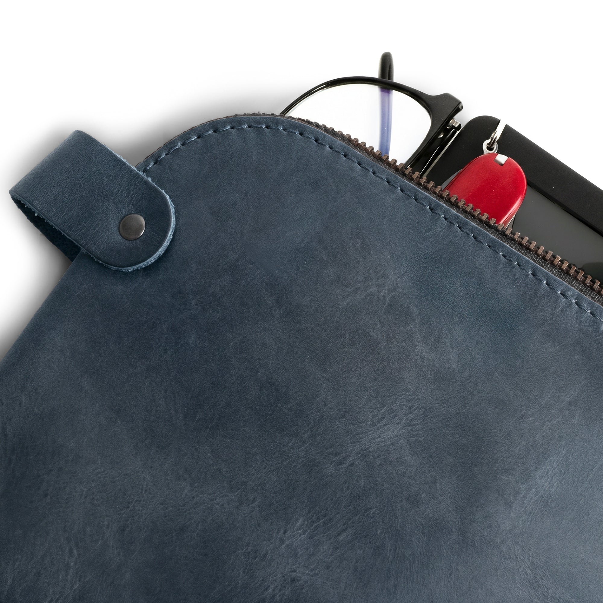 Dopp Kit Utility Bag by Hide & Drink displaying distinctive artisanal details. This large rustic all-purpose Dopp Kit Utility Bag is perfect for cords & chargers, made from high-quality full grain leather with small batch production emphasis, hand cut and hand sewn in La Antigua Guatemala & Oaxaca Mexico.