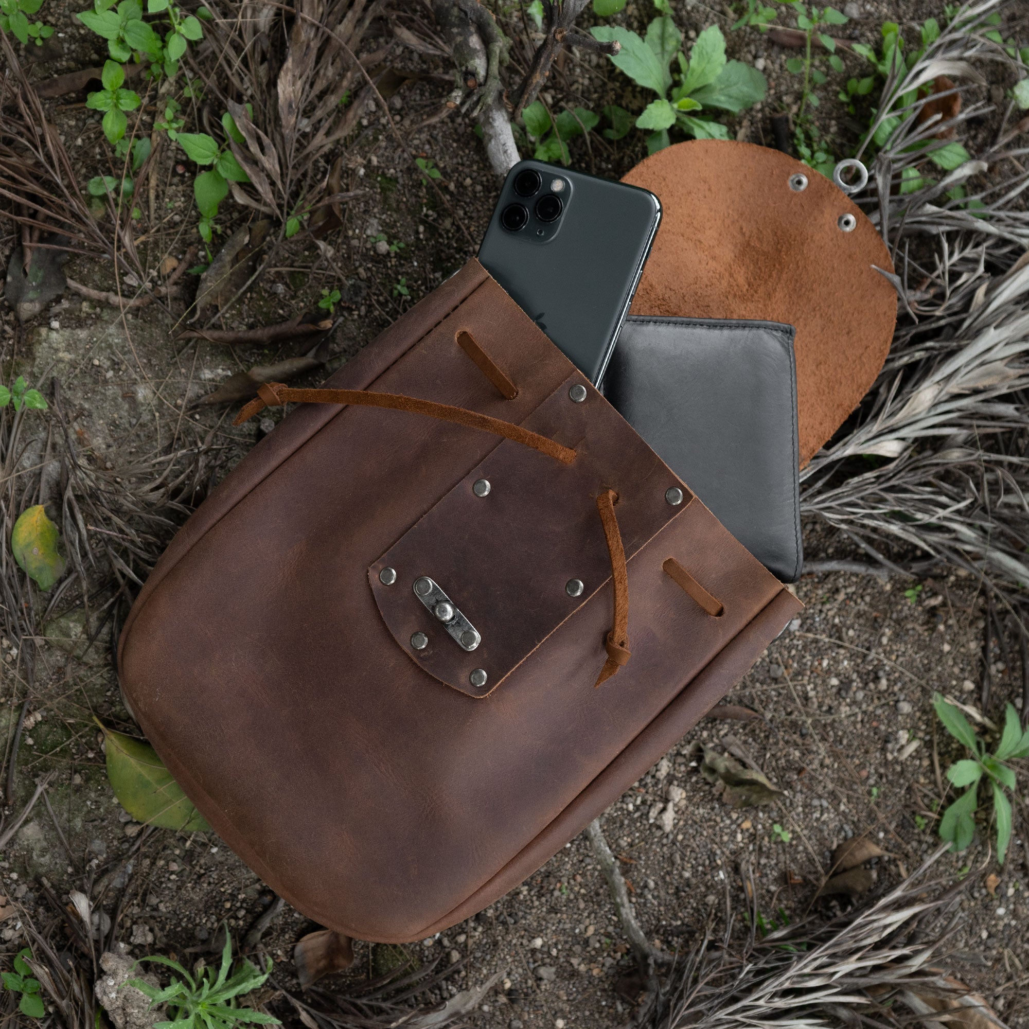 Open view of a Full Grain Leather Medieval Style Belt Bag by Valhalla Gear, displaying its spacious interior designed as a perfect Camping Pouch for Essentials. This Waist Bag combines Artisan craftsmanship with Small Batch Production, Hand Cut, Hand Sewn, and Fire Branded techniques, showcasing its Handmade nature in La Antigua Guatemala & Oaxaca Mexico.