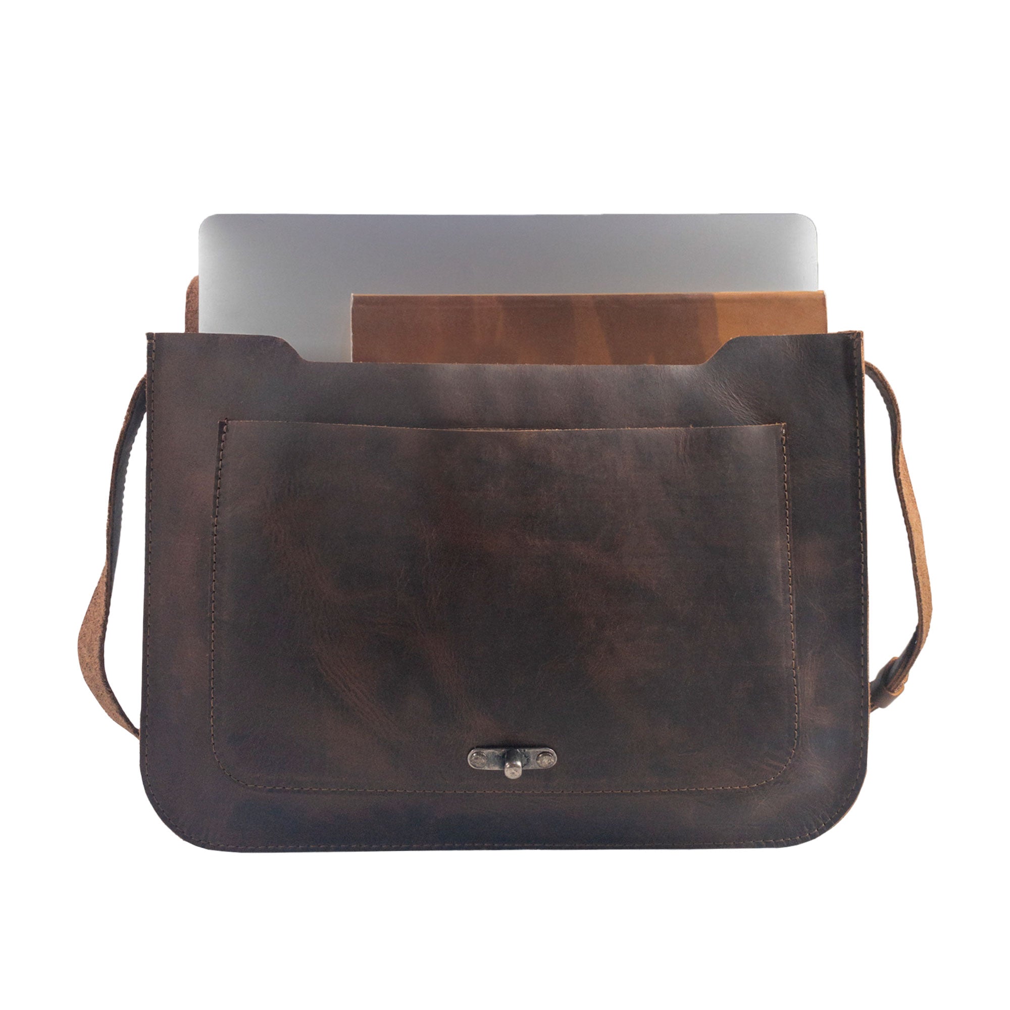 Interior view of La Antigua Classic Messenger Bag, highlighting spacious compartments ideal for laptops and documents. The full grain leather design ensures durability, making it a perfect travel accessory. Crafted with care, this handmade bag reflects small batch production and artisan techniques from La Antigua Guatemala.