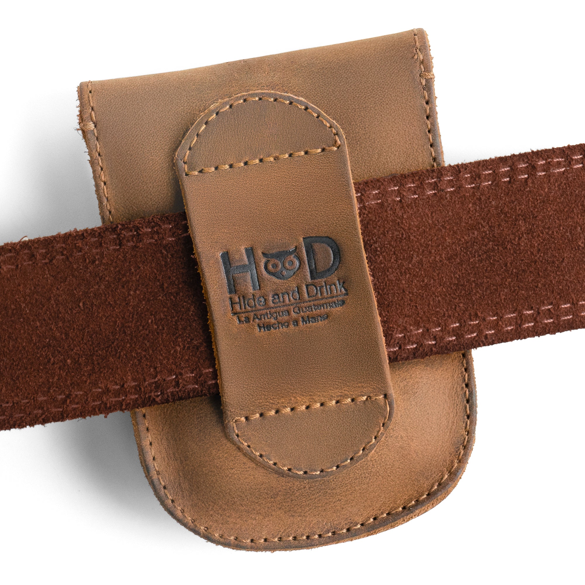 The Hide & Drink case is shown closed, demonstrating its practical design and durable material. This handcrafted, full-grain leather case is perfect for storing essential personal items.