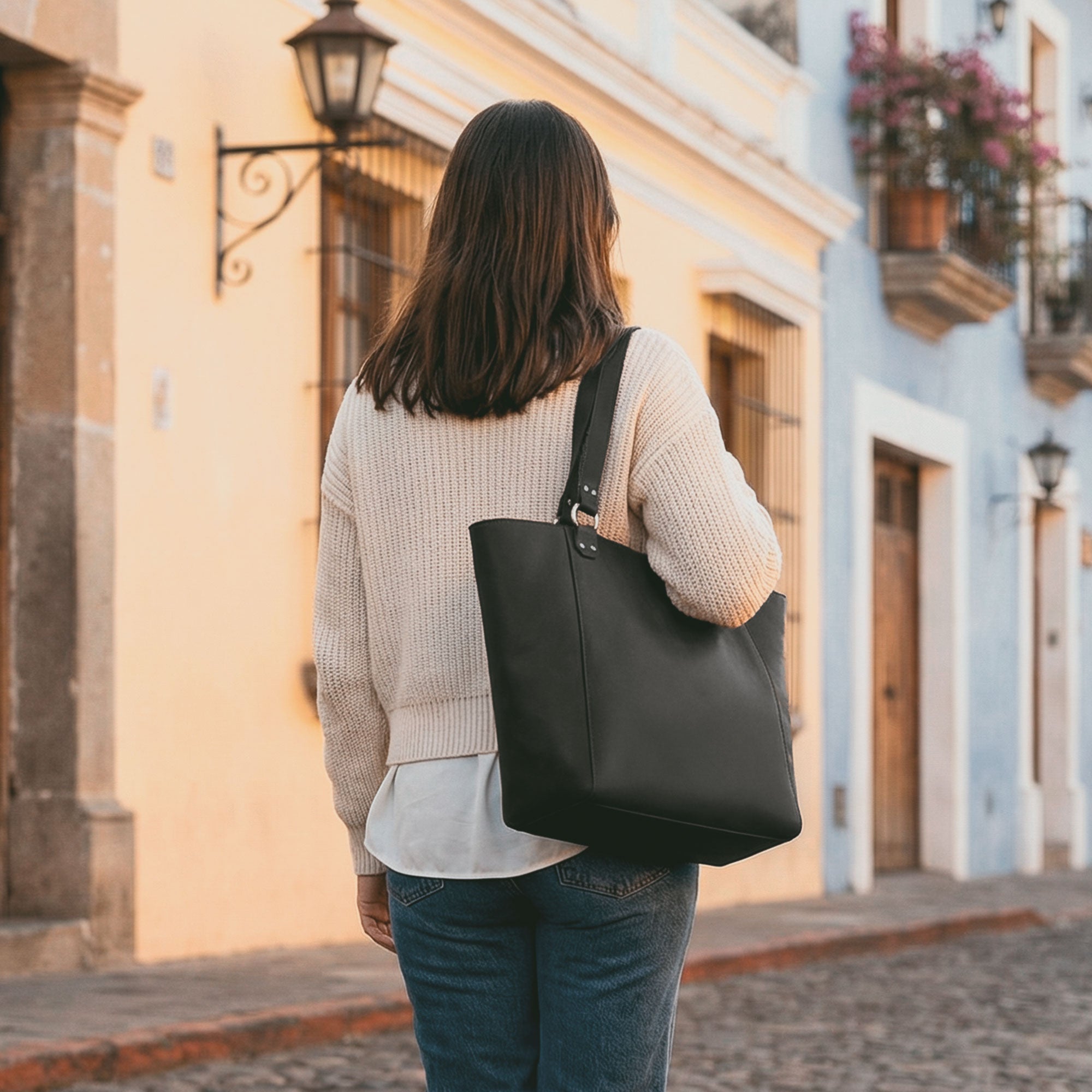 Front view of the Leather Formal Handbag by Hide & Drink, accentuating its elegant Full Grain Leather design. This artisan piece serves as a Female Formal Handbag, Shoulder Bag, or Shopping Bag, ideal for girls. Handmade in La Antigua Guatemala & Oaxaca Mexico.