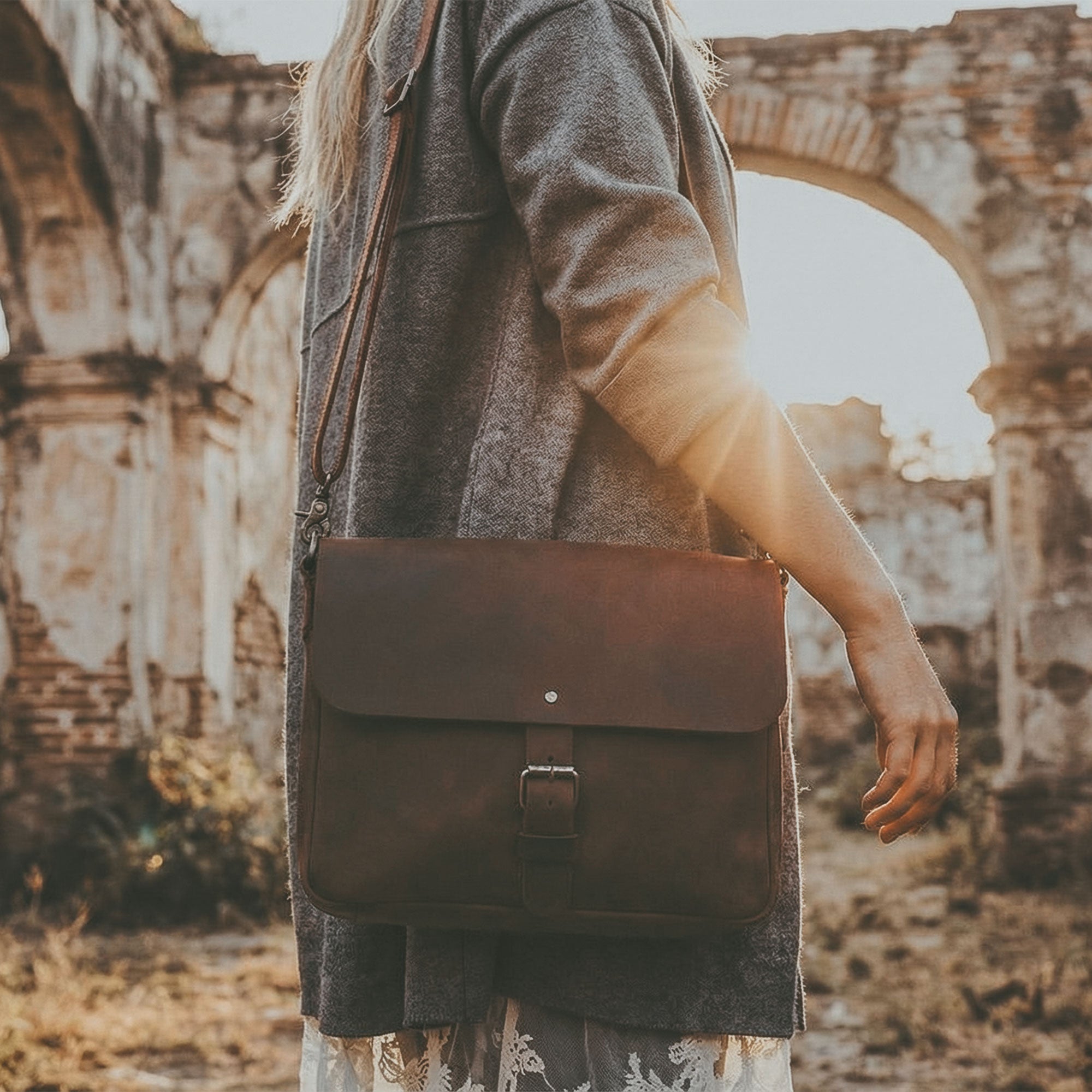 Hide & Drink’s Small Messenger Bag with tags, revealing its craftsmanship and origin. Made from high-quality Full Grain Leather, this durable crossbody bag represents a perfect travel accessory, artfully hand cut and sewn by artisans in La Antigua Guatemala & Oaxaca Mexico.